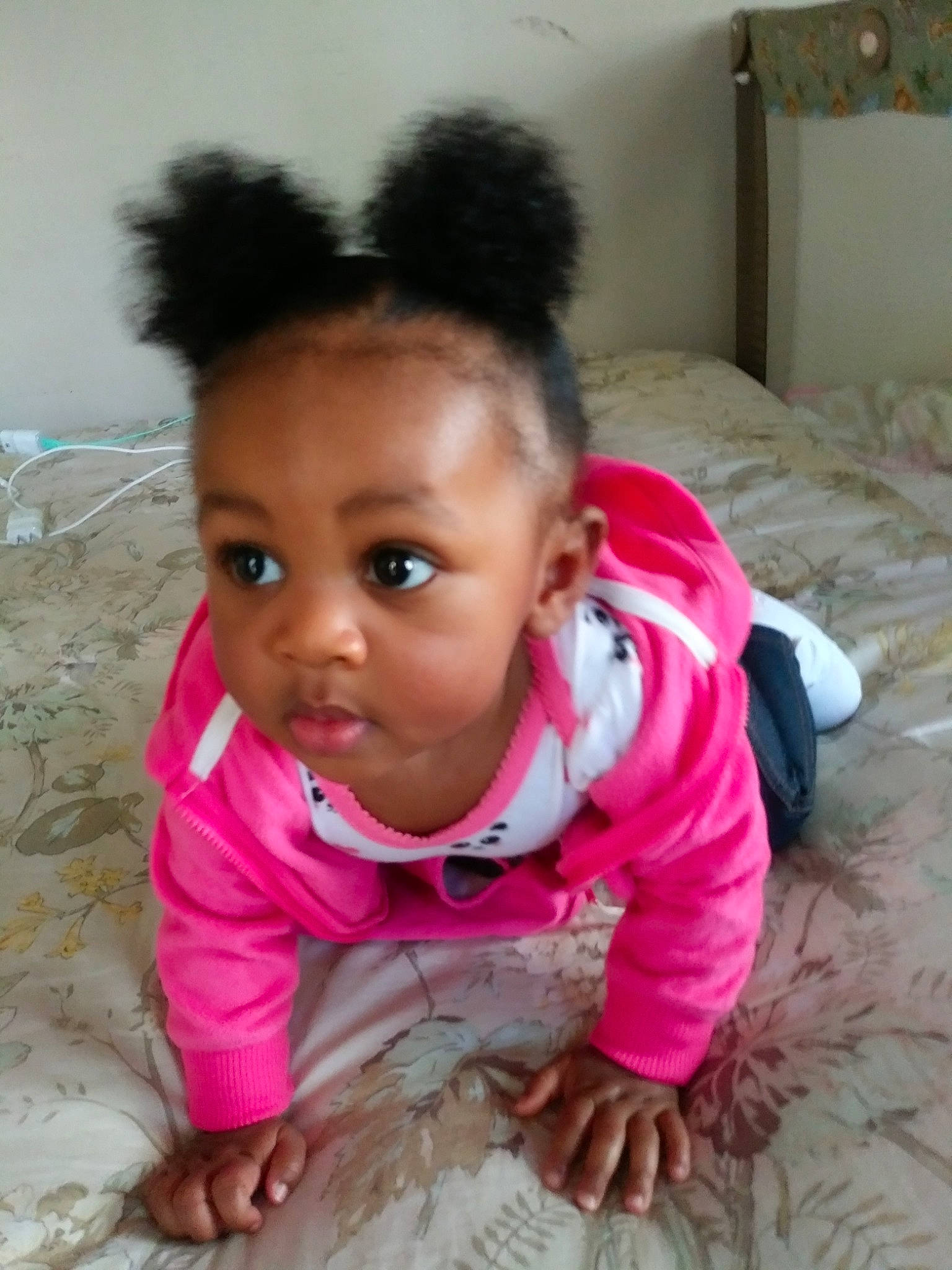 Harlem is registered to the contest to win money with this photo: baby, black_hair, cheek, child, ear, eye, face, forehead, fun, hair, hairstyle, head, lip, mouth, nose, person, pink, play, skin, smile