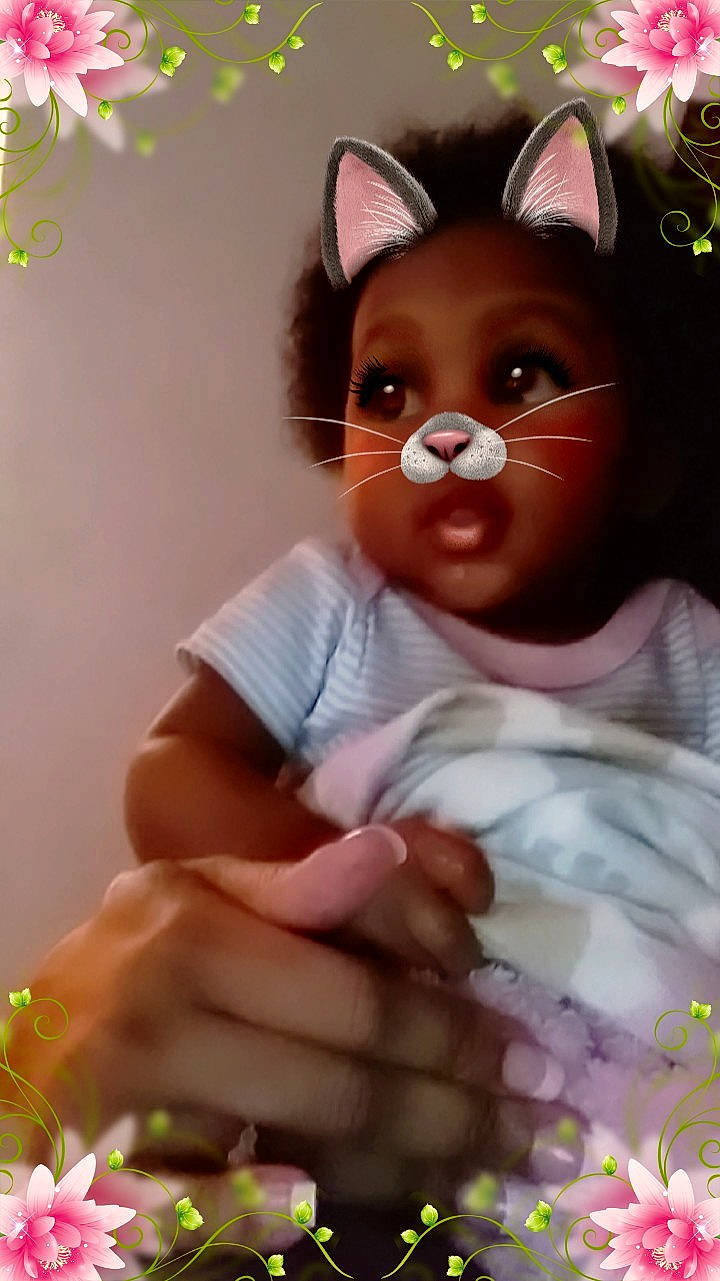 Harlem is registered to the contest to win money with this photo: baby, cat, cheek, child, ear, fawn, felidae, head, nose, person, pink, smile, toddler, whiskers