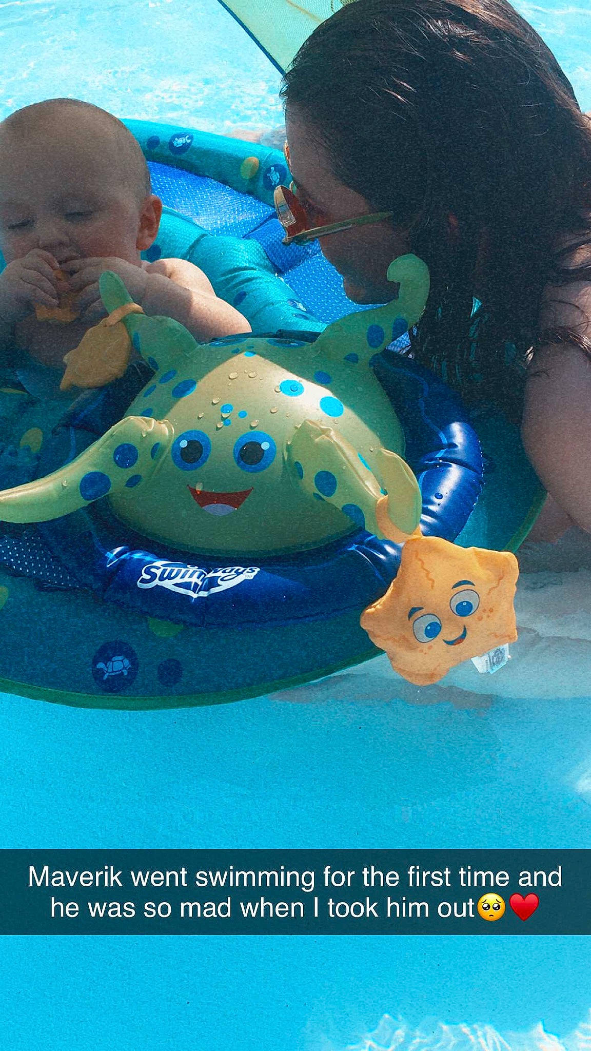 Maverik is registered to the contest to win money with this photo: aqua, azure, baby, baby_products, baby_toddler_clothing, blue, child, electric_blue, font, fun, joint, leisure, mouth, pattern, person, personal_protective_equipment, plastic, product, recreation, snapshot