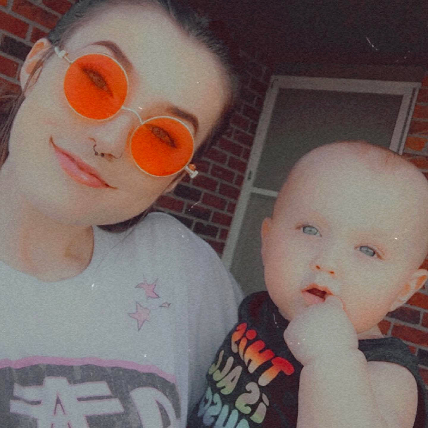 Maverik is registered to the contest to win money with this photo: cheek, chin, cool, eye, eyebrow, eyelash, eyewear, forehead, fun, hairstyle, happy, head, jaw, lip, mouth, neck, nose, organ, person, t_shirt