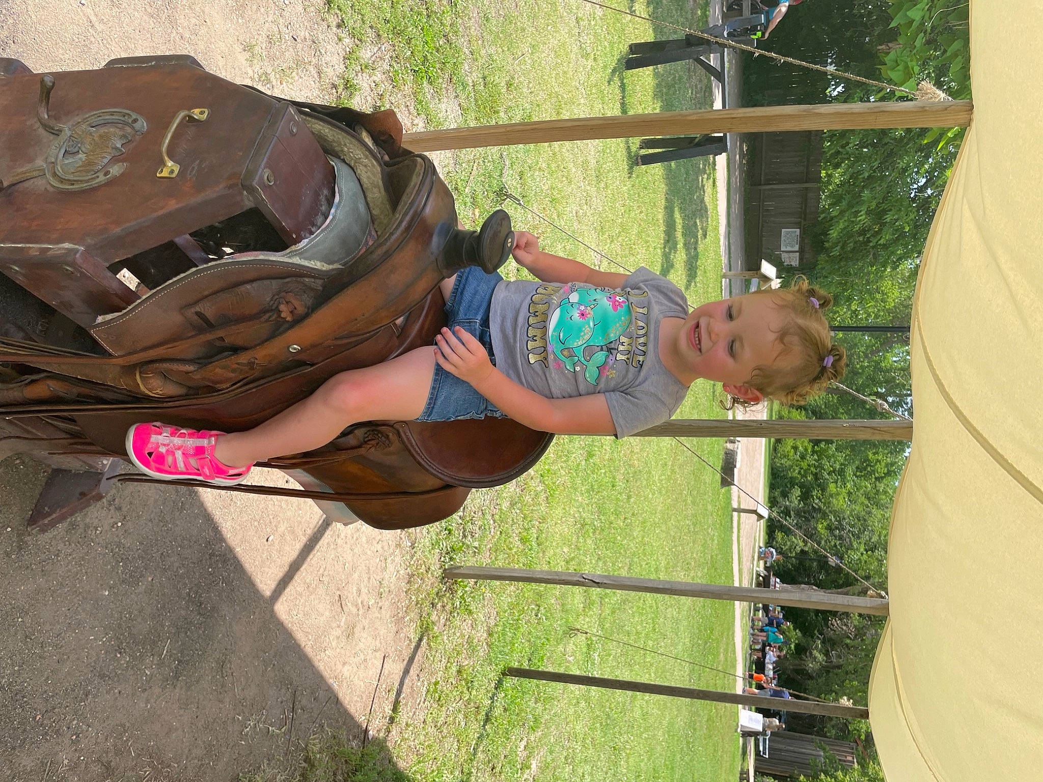 Kandyce joined the competition — help win amazing prizes! backpack, boot, child, fun, grass, hat, human_leg, leg, leisure, luggage_and_bags, outdoor_shoe, person, plant, recreation, sandal, shorts, t_shirt, thigh, toddler, tree