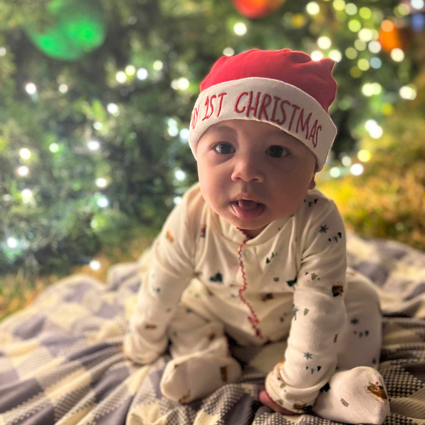 Kingston joined the competition — help win amazing prizes! baby, blanket, celebration, child, christmas, clothing, cute, festive, hat, holiday, indoor, lights, ornaments, pattern, portrait, red, sitting, smile, tree, white