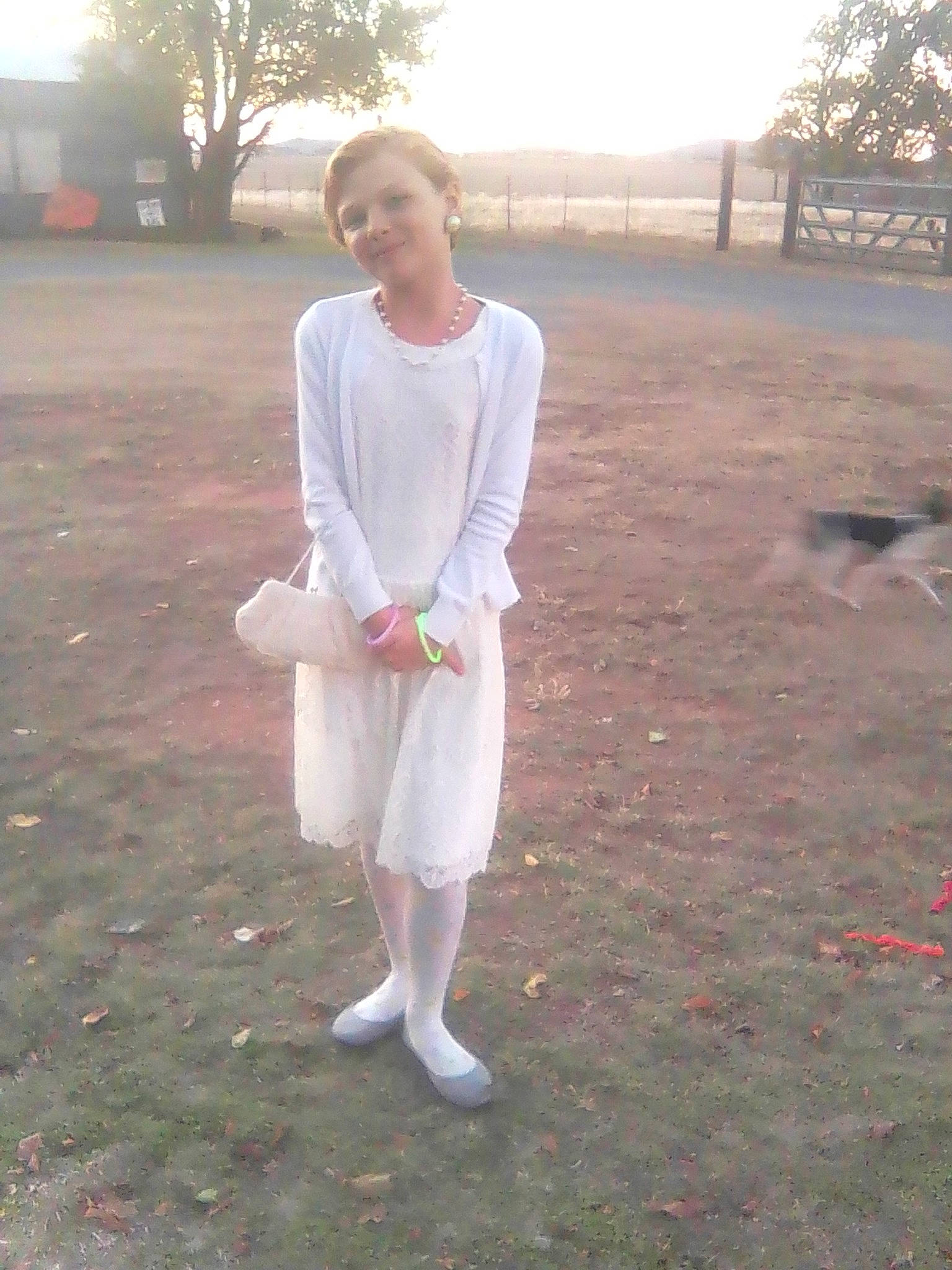 Genesis is registered to the contest to win money with this photo: barefoot, flash_photography, foot, formal_wear, fun, grass, human_leg, joy, knee, leisure, magenta, peach, person, plant, recreation, sitting, sky, sleeve, soil, tree