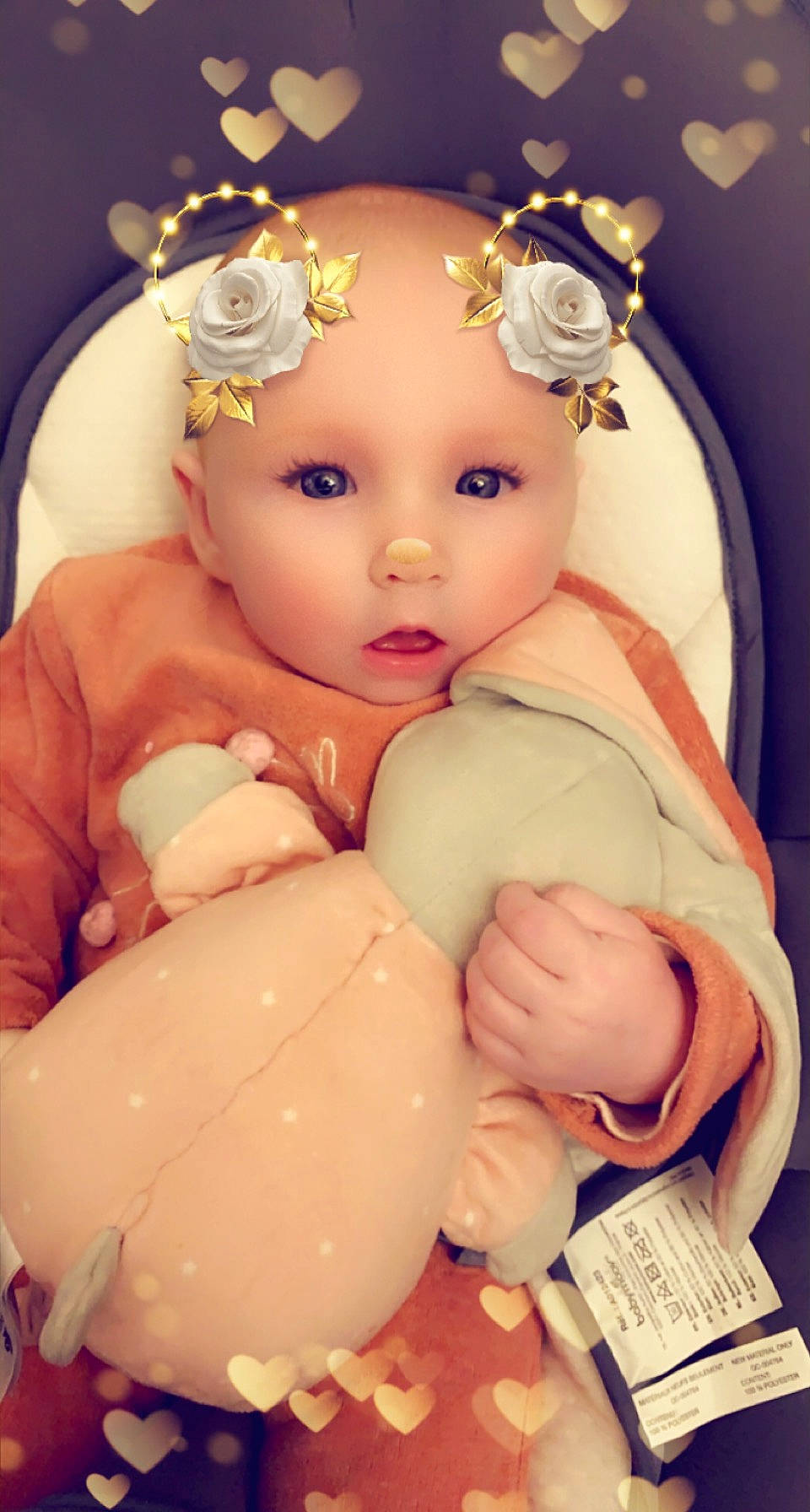 Mia participe au concours pour gagner de l'argent avec cette photo : baby, baby_products, baby_sleeping, baby_toddler_clothing, cheek, child, embellishment, hair_accessory, headband, headpiece, mouth, nose, peach, skin