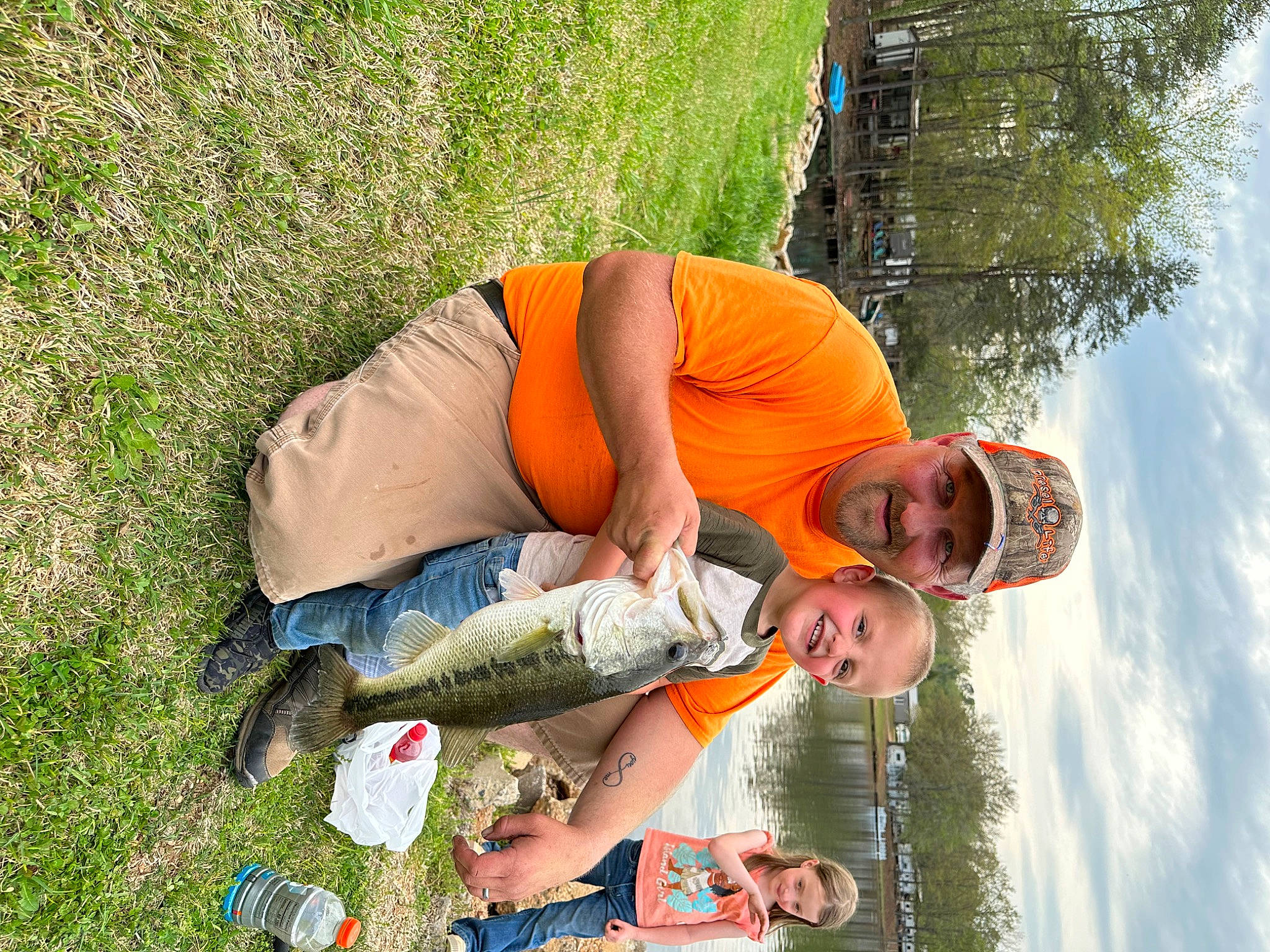 Henry is registered to the contest to win money with this photo: child, cloud, event, fun, grass, grass_family, grassland, happy, headwear, joy, leisure, people_in_nature, person, plant, recreation, shorts, sky, smile, t_shirt, travel