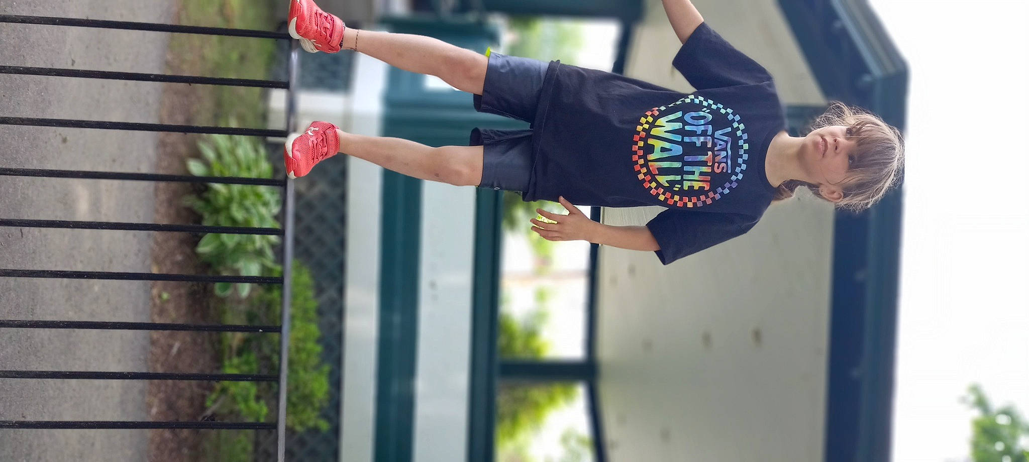 Jolene joined the competition — help win amazing prizes! arm, elbow, entertainment, fence, fun, gesture, hand, happy, human_leg, leisure, performing_arts, person, plaid, player, recreation, shorts, sports, sportswear, t_shirt, thigh