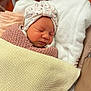 newborn, baby, sleeping, blanket, headband, hospital_bassinet, cozy, infant, soft_lighting, cute, peaceful, wrapped, sleep, child, person, knit_blanket, white_blanket, pink, fabric, indoors
