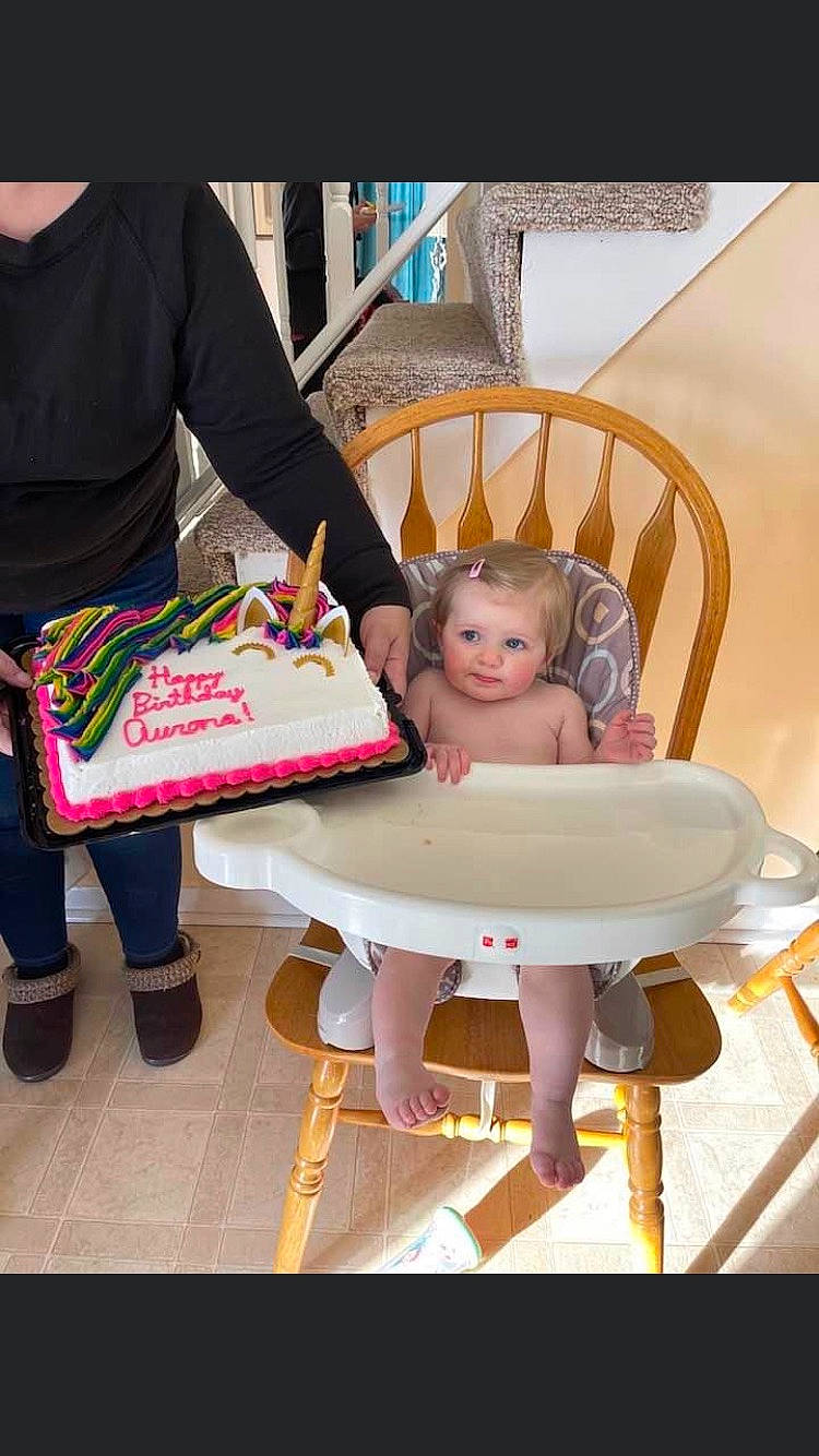 Aurora is registered to the contest to win money with this photo: baby, baby_products, bag, chair, child, doll, event, fashion_accessory, flooring, fun, leg, magenta, peach, person, pink, play, room, sitting, thigh, toddler