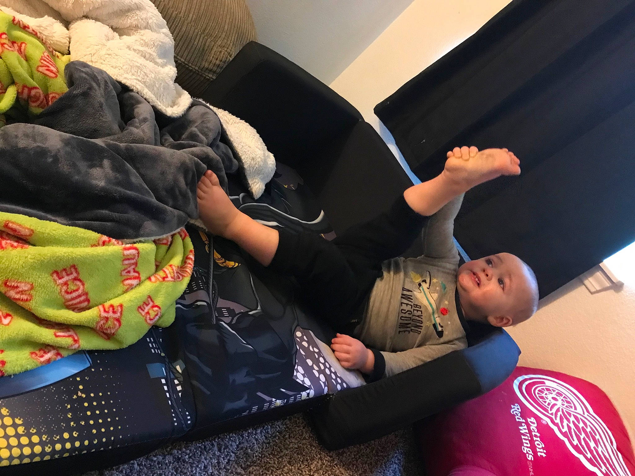 Dakoda joined the competition — help win amazing prizes! bag, baggage, child, comfort, couch, elbow, flooring, fun, human_leg, knee, leisure, linens, luggage_and_bags, pattern, person, room, sitting, sportswear, t_shirt, textile