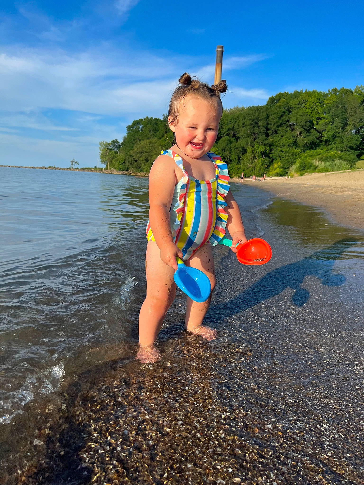 Journi joined the competition — help win amazing prizes! azure, beach, cloud, coastal_and_oceanic_landforms, electric_blue, fun, happy, lake, leisure, people_in_nature, people_on_beach, person, recreation, sand, shore, sky, summer, sunlight, toddler, tree
