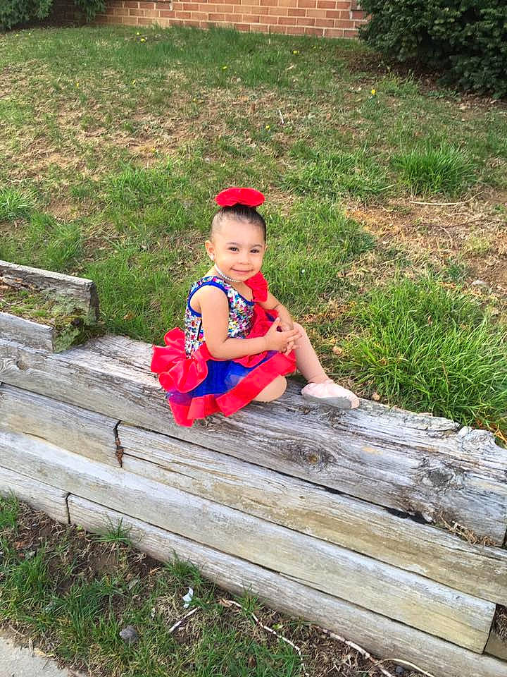 Abigail is registered to the contest to win money with this photo: child, fun, garden, girl, grass, joy, lawn, leisure, person, plant, play, recreation, red, sitting, toddler, tree, vacation