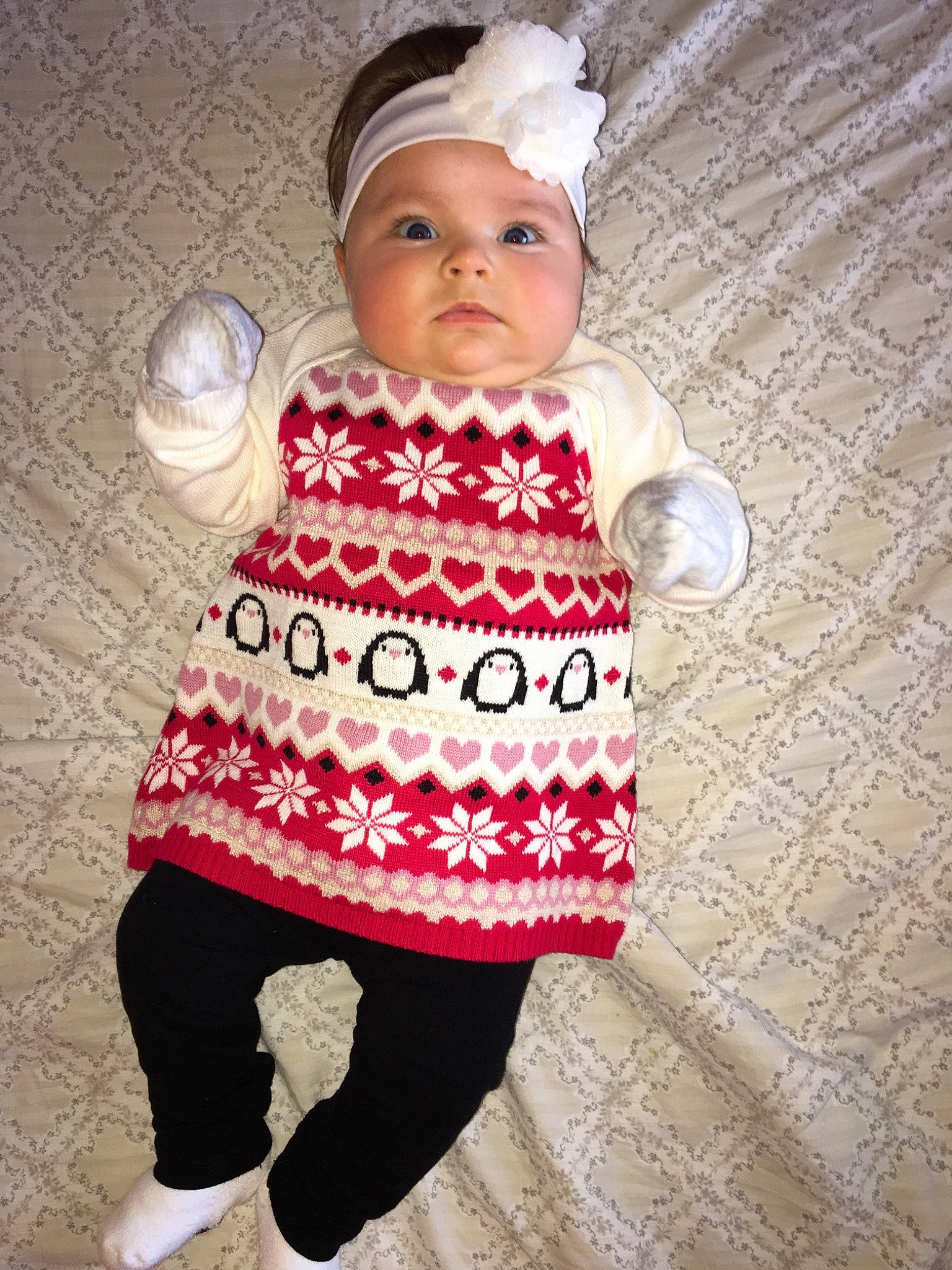 Leanna is registered to the contest to win money with this photo: child, clothing, costume, crochet, design, girl, headgear, infant, material, outerwear, pattern, person, pink, product, red, textile, toddler, white