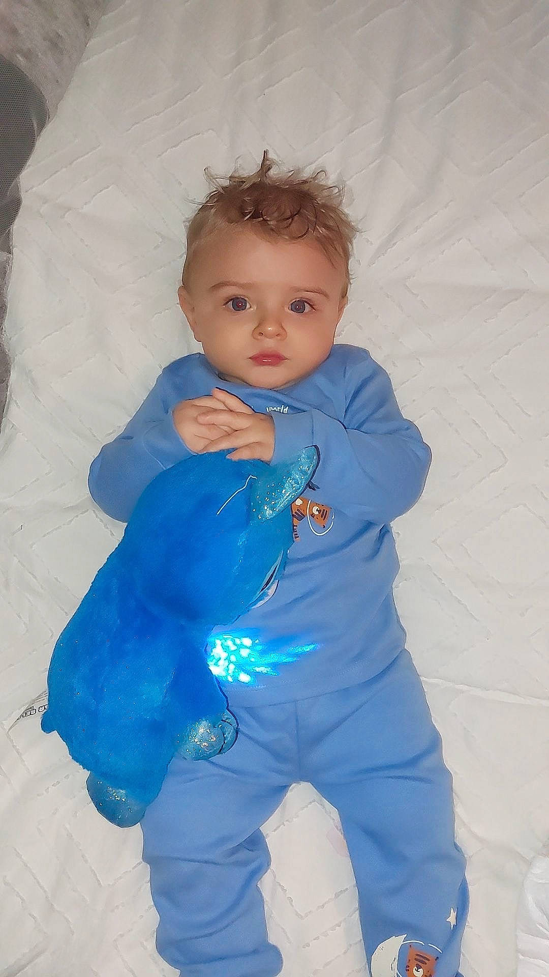 Caleb-james joined the competition — help win amazing prizes! baby, baby_products, baby_toddler_clothing, cheek, child, comfort, electric_blue, eye, fun, iris, linens, pattern, person, personal_protective_equipment, sitting, skin, sleeve, sweatpant, t_shirt, toddler