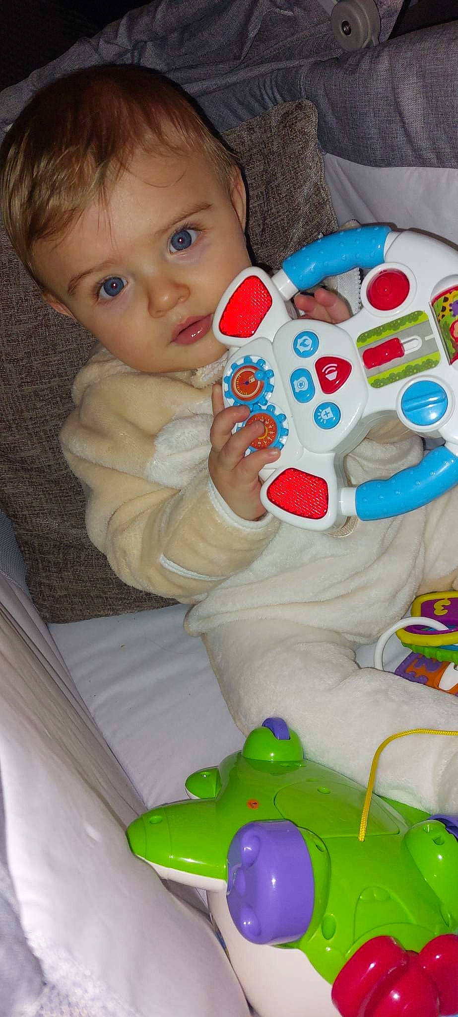 Caleb-james joined the competition — help win amazing prizes! baby, baby_playing_with_toys, baby_toddler_clothing, baby_toys, blue, cheek, child, face, fun, gadget, head, input_device, joystick, nose, peripheral, person, play, product, sitting, toddler