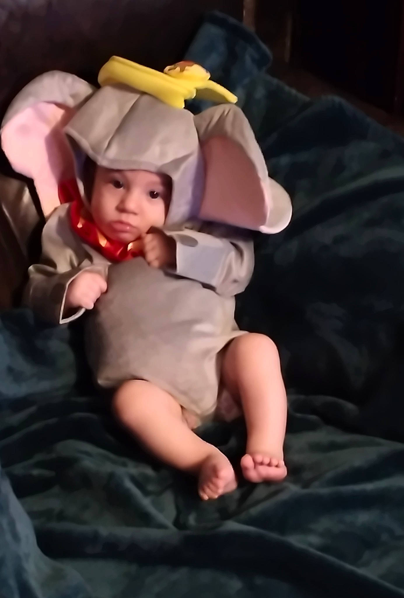 Atlasjimmy is registered to the contest to win money with this photo: abdomen, baby, baby_products, chest, child, comfort, foot, fun, gesture, happy, headwear, human_body, human_leg, knee, lap, linens, person, sitting, thigh, thumb