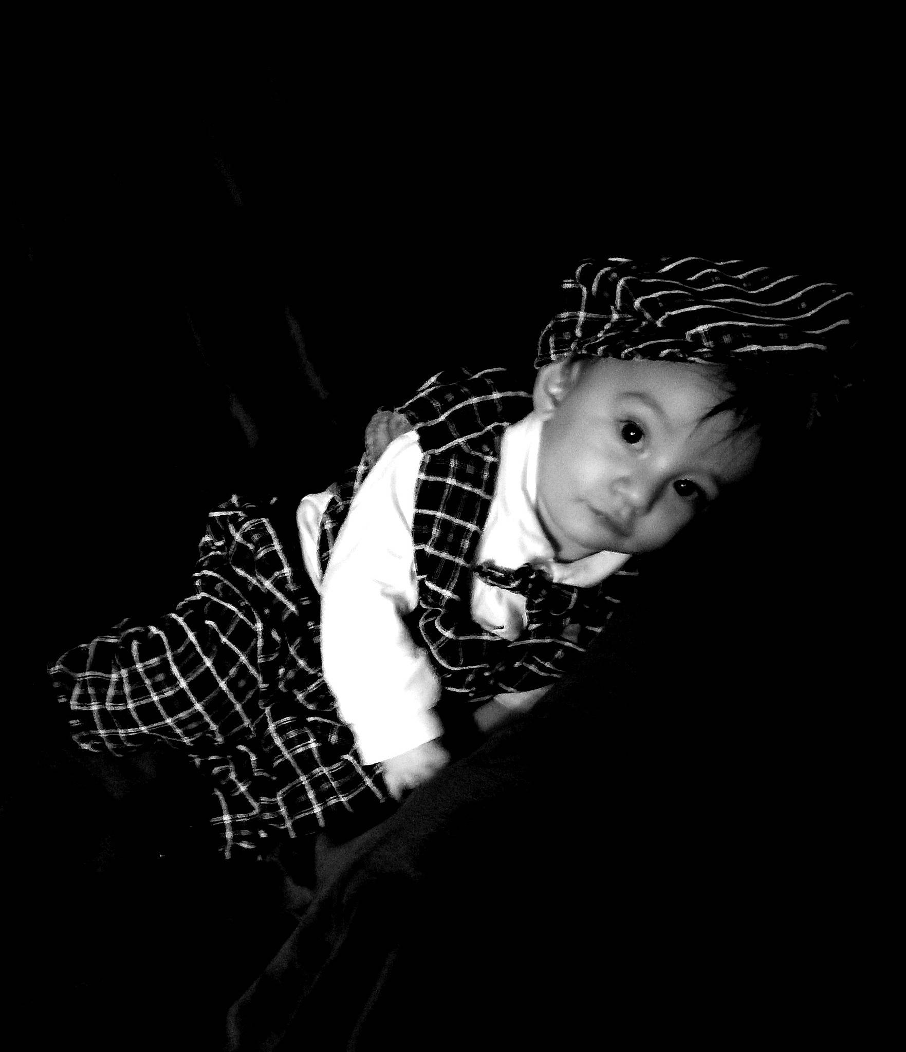 Atlasjimmy is registered to the contest to win money with this photo: child, darkness, fashion_accessory, flash_photography, fun, fur, monochrome, monochrome_photography, night, pattern, person, plaid, portrait, portrait_photography, room, sitting, sleeve, tartan, tints_and_shades, toddler