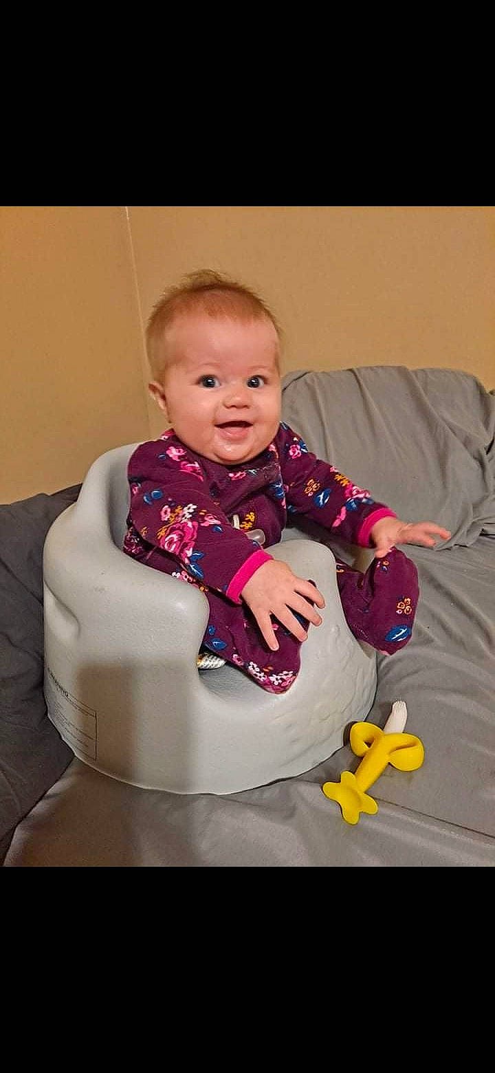 Kynlee joined the competition — help win amazing prizes! baby, baby_playing_with_toys, baby_products, baby_toddler_clothing, chair, cheek, child, comfort, fun, happy, lap, magenta, person, product, purple, sitting, sleeve, smile, sock, t_shirt