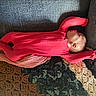 baby, child, comfort, couch, cozy, cute, home, indoor, infant, knitted_blanket, peaceful, portrait, red_onesie, relaxation, resting, sleeping, soft_light, texture, toddler, warm_colors