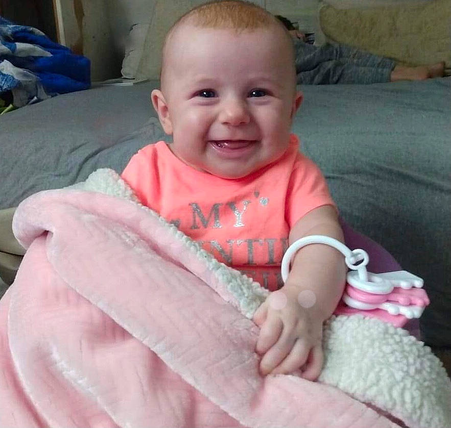 Kalliope joined the competition — help win amazing prizes! baby, baby_toddler_clothing, cheek, child, comfort, eye, facial_expression, finger, happy, iris, joy, linens, mouth, nose, person, pink, skin, sleeve, smile, textile