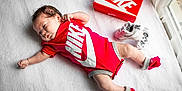 Victoire participe au concours pour gagner de l'argent avec cette photo : ankle, baby, baby_toddler_clothing, carmine, child, comfort, fictional_character, foot, glove, human_leg, logo, play, red, sandal, shoe, slipper, sock, toddler, toe, walking_shoe