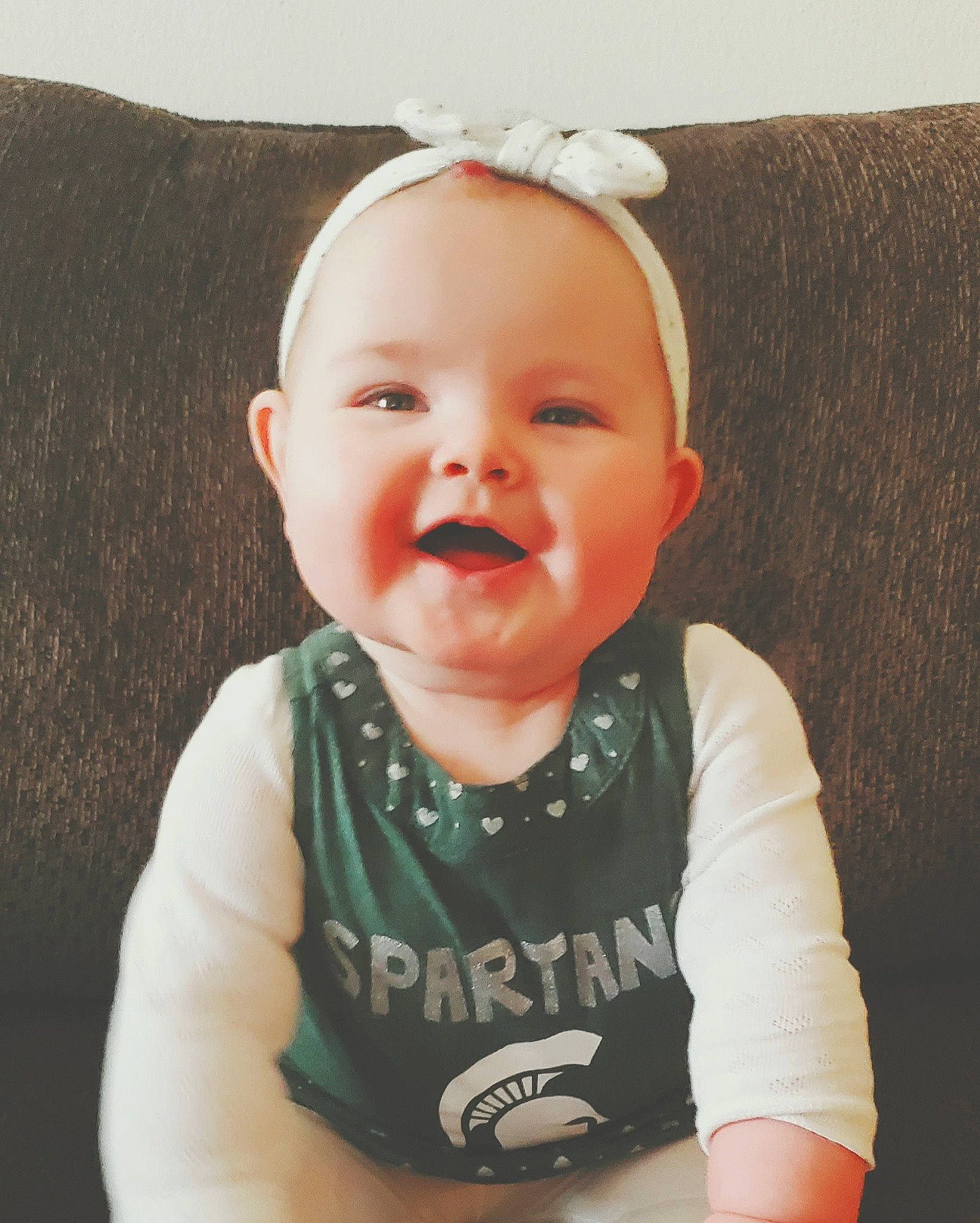 Emma-grace is registered to the contest to win money with this photo: baby, baby_toddler_clothing, cheek, clothing, eye, eyebrow, flash_photography, hair, happy, human_body, iris, lip, mouth, neck, nose, person, product, skin, sleeve, smile