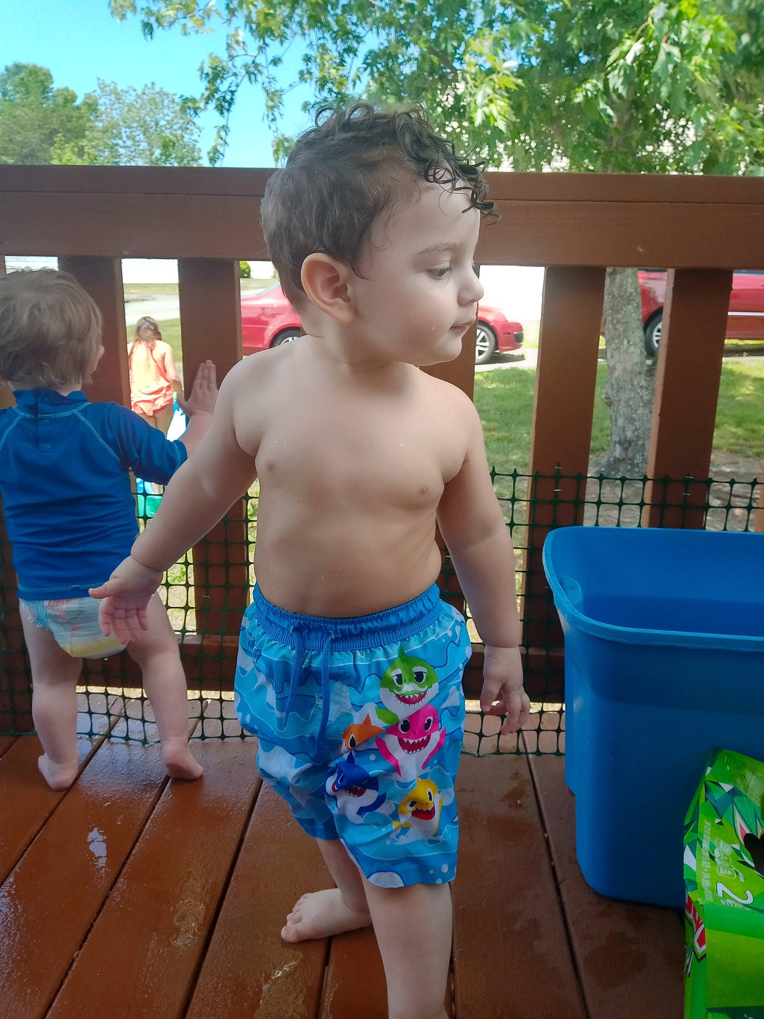 Emmanuel joined the competition — help win amazing prizes! barefoot, blue, blurred, chest, electric_blue, fun, grass, green, happy, leg, leisure, person, play, recreation, shorts, sky, swimwear, thigh, toddler, tree