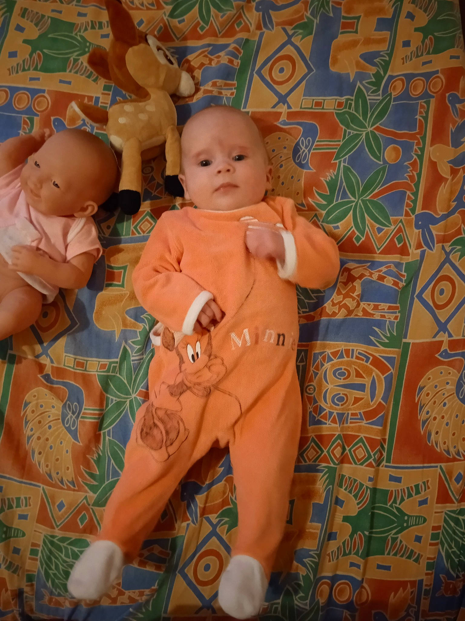 Rose participe au concours pour gagner de l'argent avec cette photo : abdomen, arm, baby, baby_products, baby_toddler_clothing, cheek, chest, child, doll, finger, linens, pattern, peach, person, sitting, skin, textile, thumb, toddler, toy