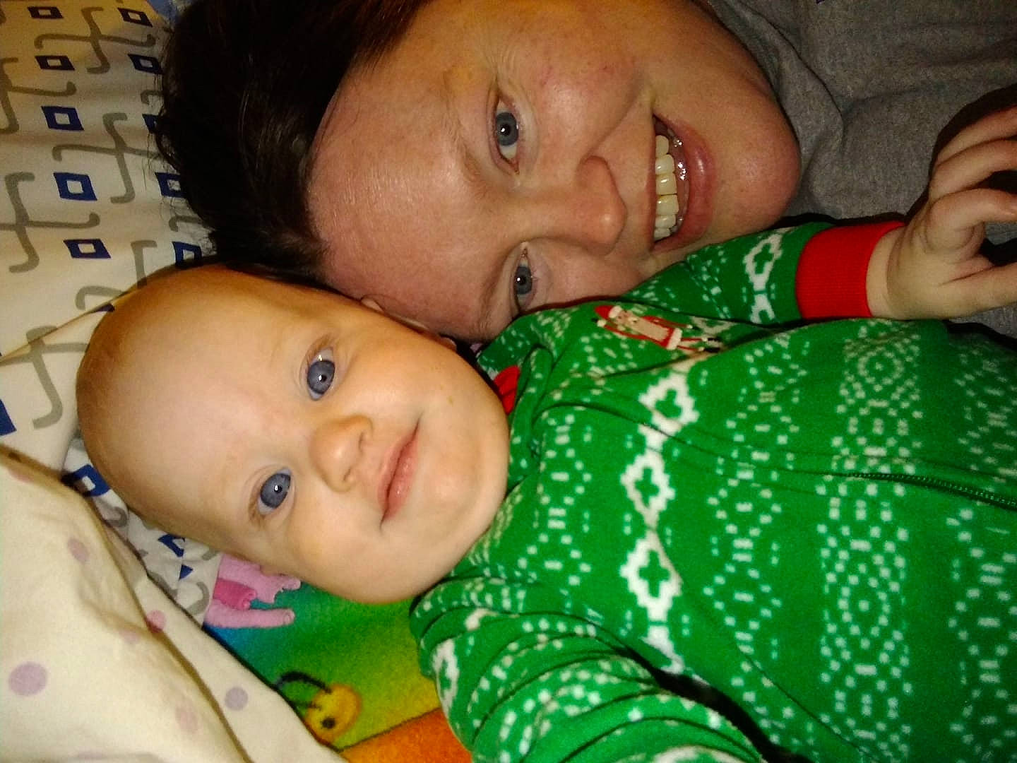 Rosie is registered to the contest to win money with this photo: black_hair, cheek, child, eye, eyebrow, face, finger, forehead, girl, green, head, infant, lip, mouth, nose, organ, person, product, skin, smile