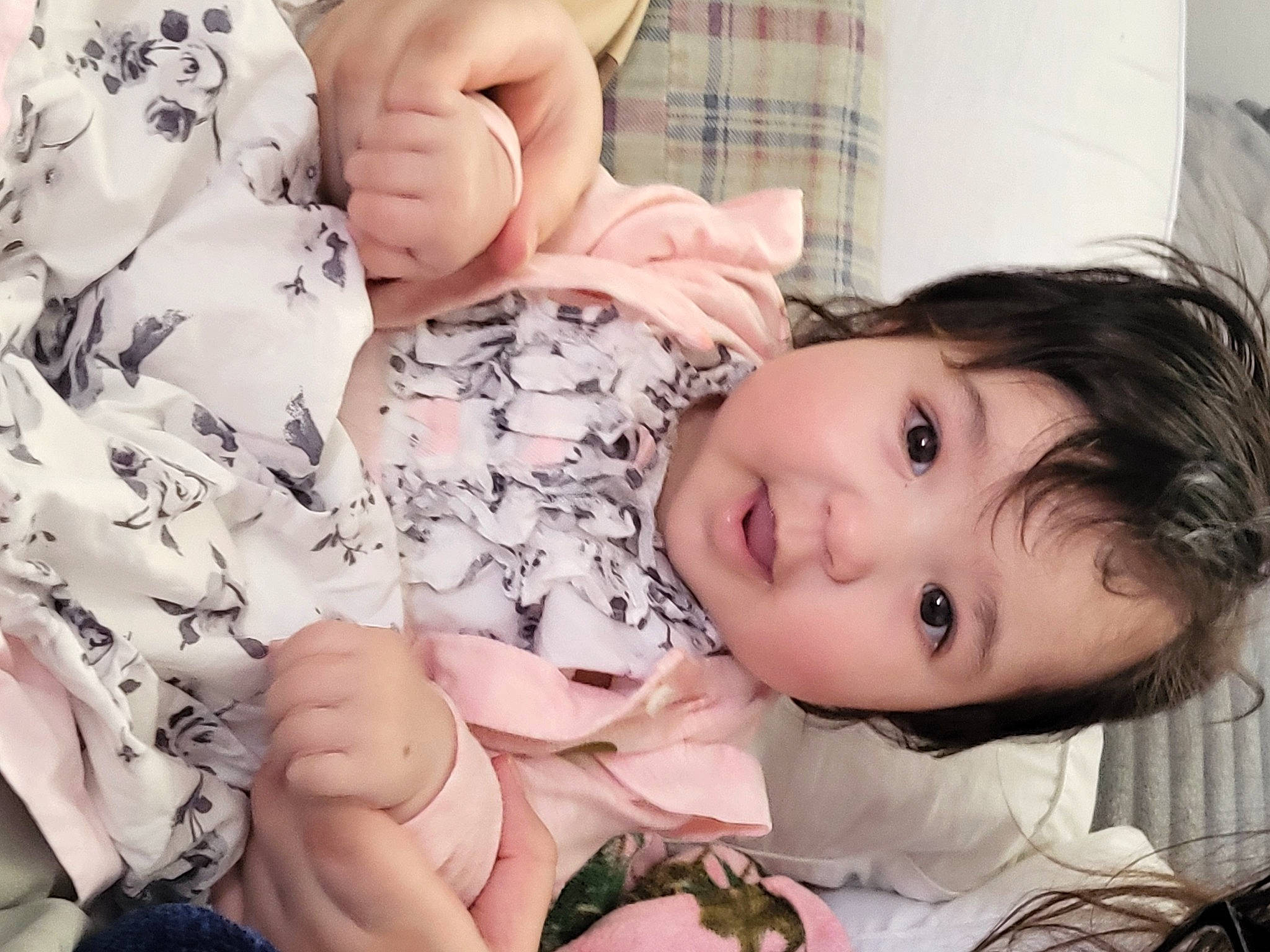 Carrie is registered to the contest to win money with this photo: baby_toddler_clothing, cheek, comfort, eye, eyelash, finger, gesture, hand, happy, head, iris, lip, mouth, neck, nose, person, pink, skin, sleeve, thigh