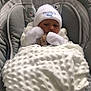 baby, infant, blanket, hat, white, cushion, baby_seat, cozy, cute, sleepy, child, soft, knit, warm, indoor, portrait, newborn, comfortable, wrapped, peaceful