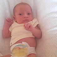 Archie is registered to the contest to win money with this photo: baby, baby_girl_or_boy, baby_pose, blanket, clothing, cozy, cute, diaper, indoors, infant, lying_down, new_life, newborn, peaceful, portrait, skin, sleepy_eyes, small_hands, soft_texture, white_blanket