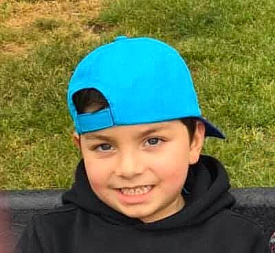 Denis is registered to the contest to win money with this photo: baseball_cap, beanie, bonnet, cap, child, clothing, fashion_accessory, hat, head, headgear, headwear, joy, person, toddler, turquoise