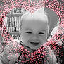 baby, child, smiling, heart_shape, pink_dots, black_and_white, indoor, cans, shelf, person, face, happy, cute, portrait, cozy, overlay, sparkle, love, warm, family