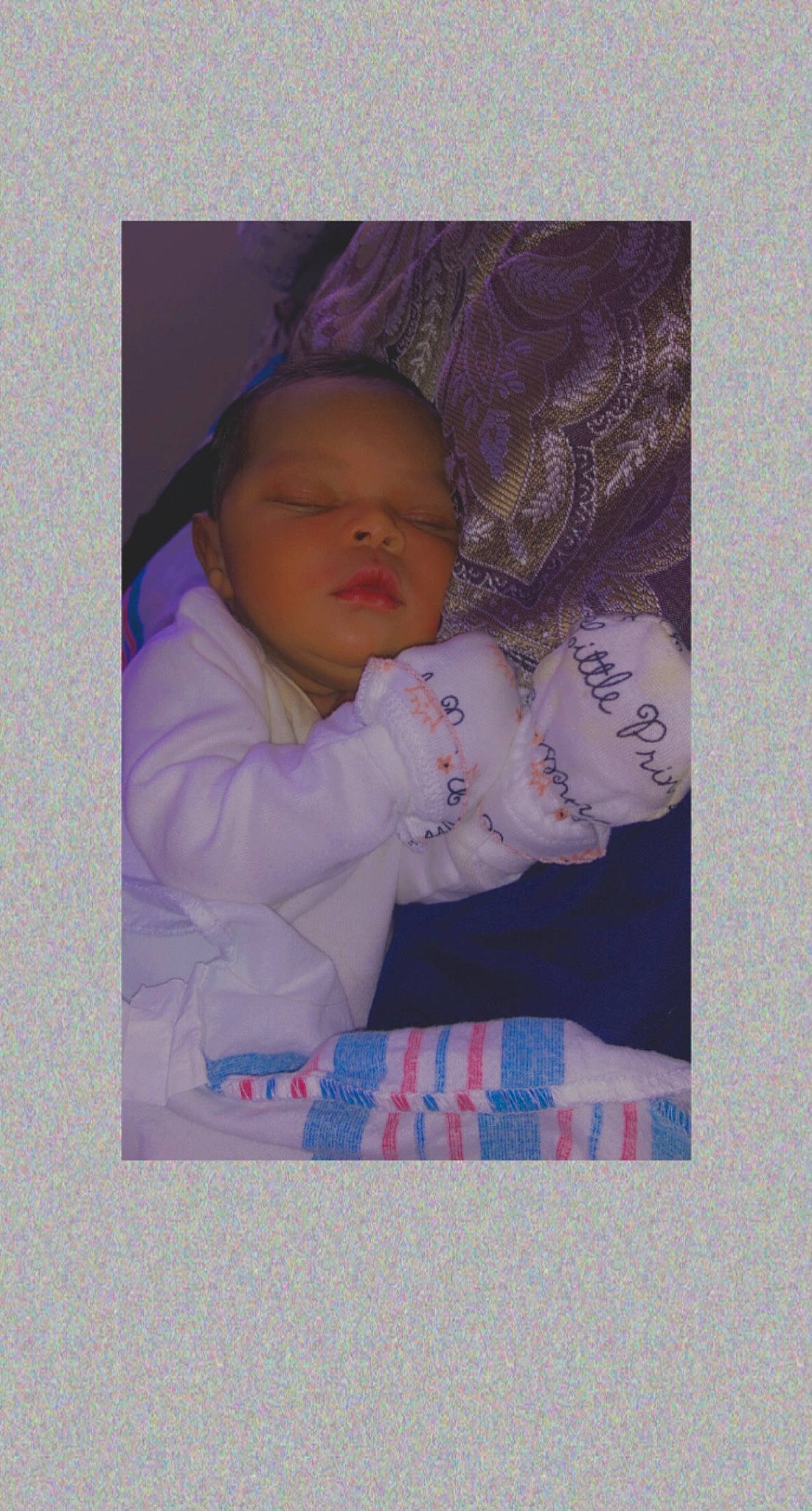 Imani joined the competition — help win amazing prizes! art, baby, baby_products, baby_sleeping, baby_toddler_clothing, beanie, cap, cheek, child, comfort, knit_cap, linens, magenta, nap, pattern, person, purple, room, sleeve, toddler