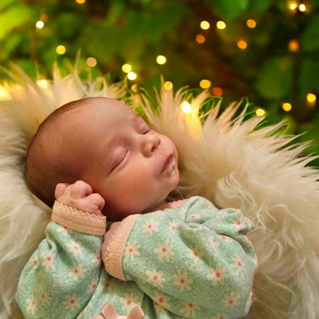 Nathalee is registered to the contest to win money with this photo: angel, baby, blanket, blonde, clothing, coat, costume, face, glove, hair, head, jacket, lady, newborn, pajamas, person, photography, portrait, sleeping, yawning
