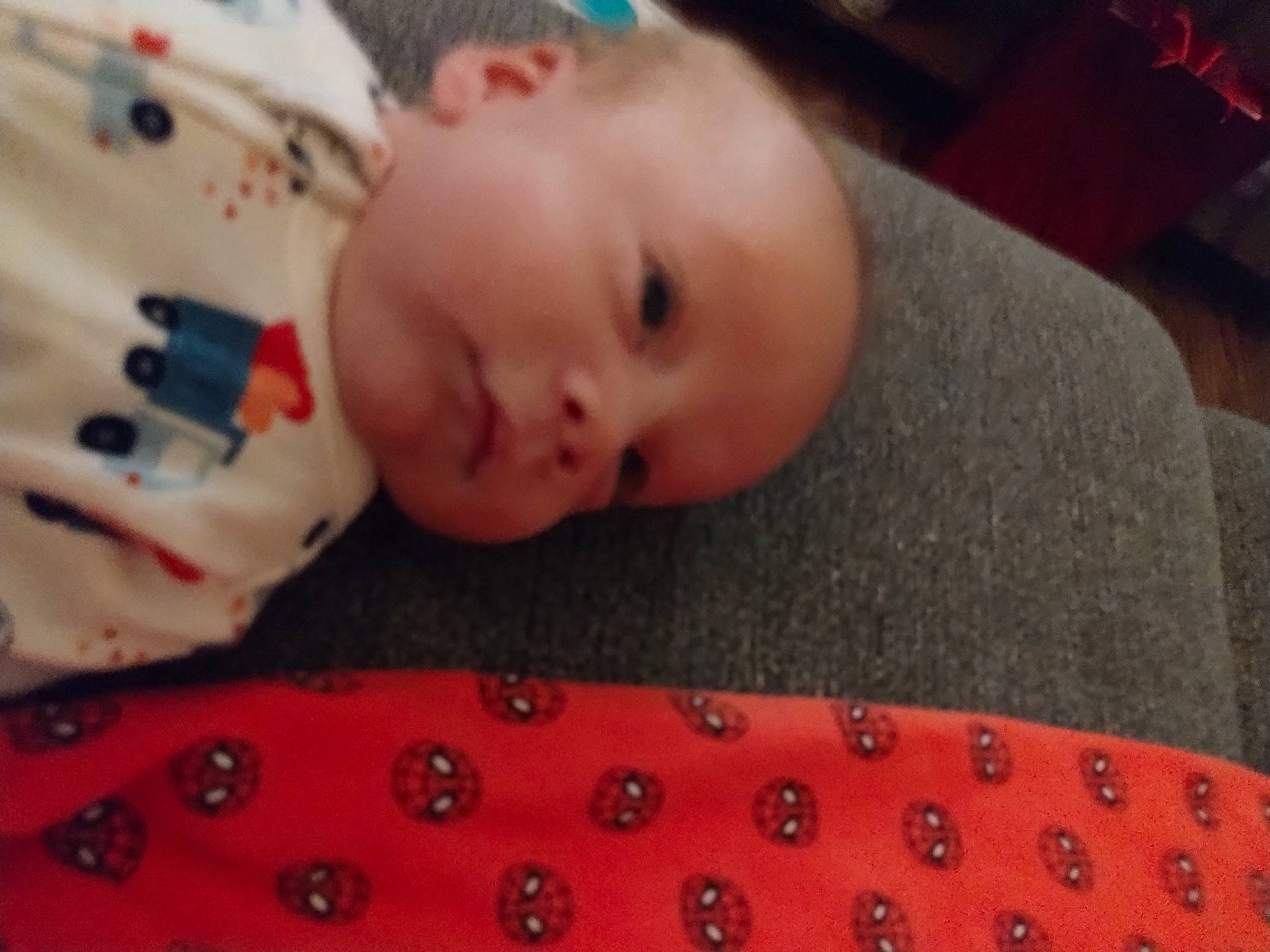 Grayson joined the competition — help win amazing prizes! baby, baby_products, baby_safety, baby_toddler_clothing, carmine, cheek, child, comfort, flooring, head, iris, linens, lip, mouth, nose, pattern, person, skin, textile, toddler