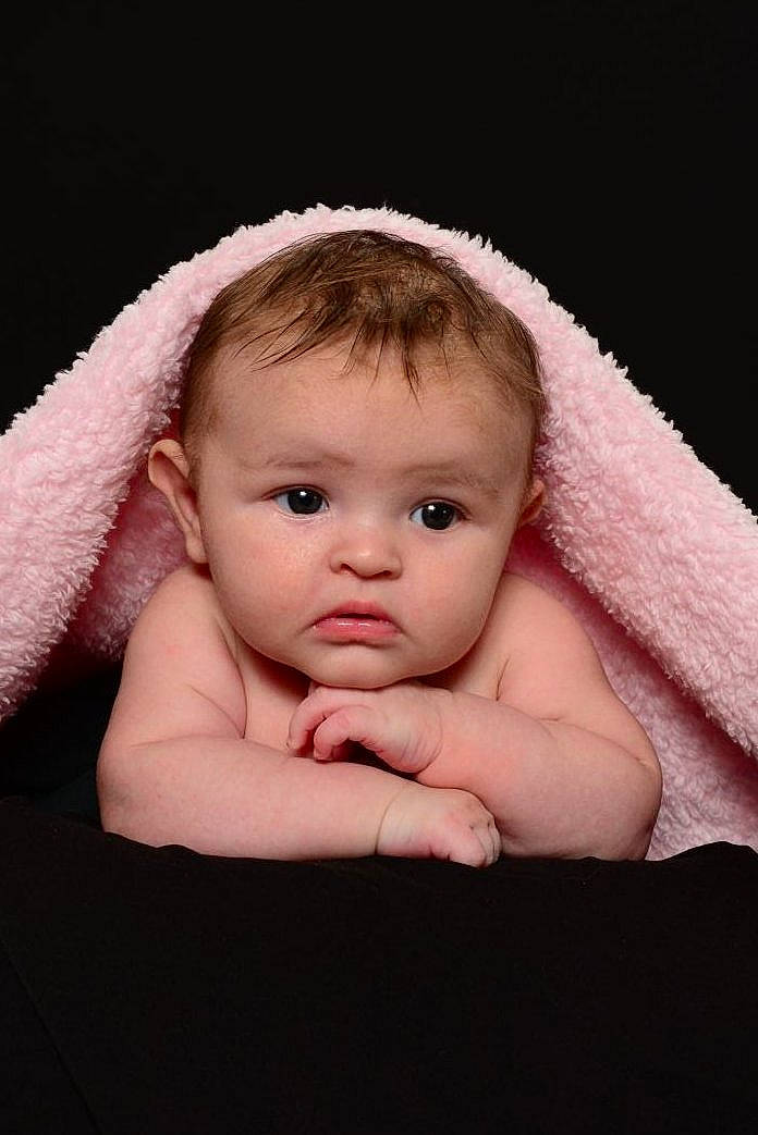 Lainey joined the competition — help win amazing prizes! baby, baby_toddler_clothing, cheek, child, comfort, eye, eyebrow, face, fashion_accessory, flash_photography, fur, hand, happy, head, iris, linens, lip, person, sitting, skin