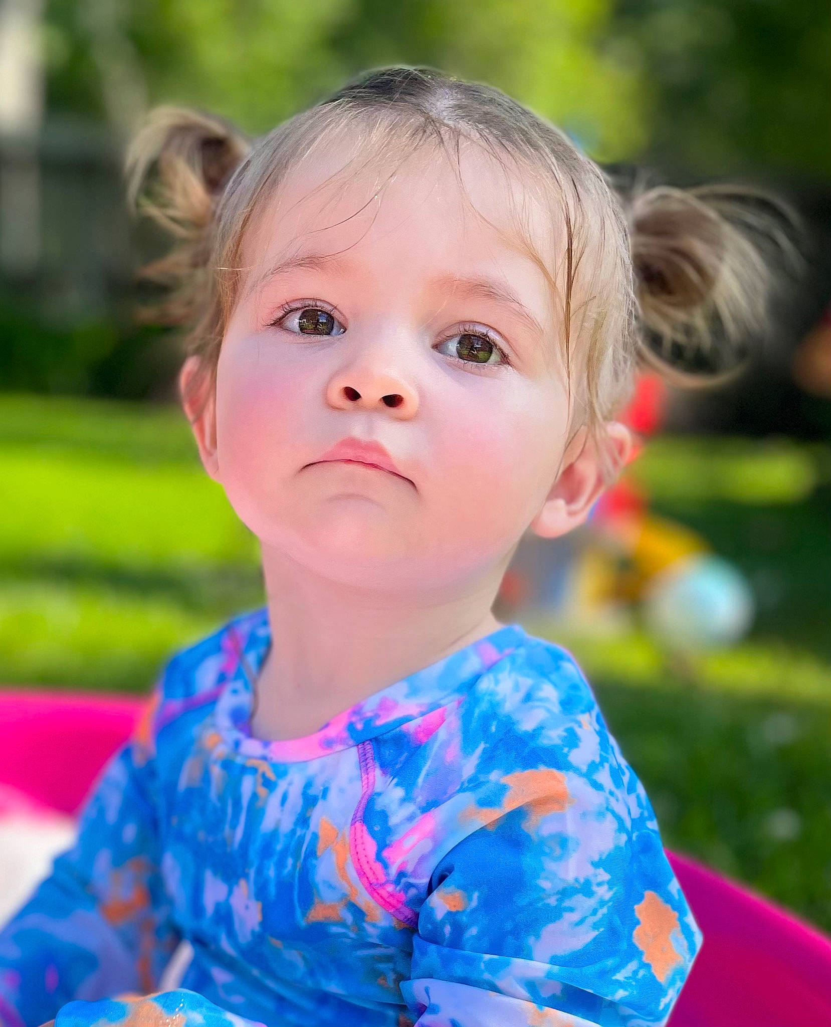 Eden joined the competition — help win amazing prizes! blond, child, electric_blue, event, fun, grass, hair, happy, head, iris, leisure, lip, nose, people_in_nature, person, plant, play, recreation, sitting, toddler