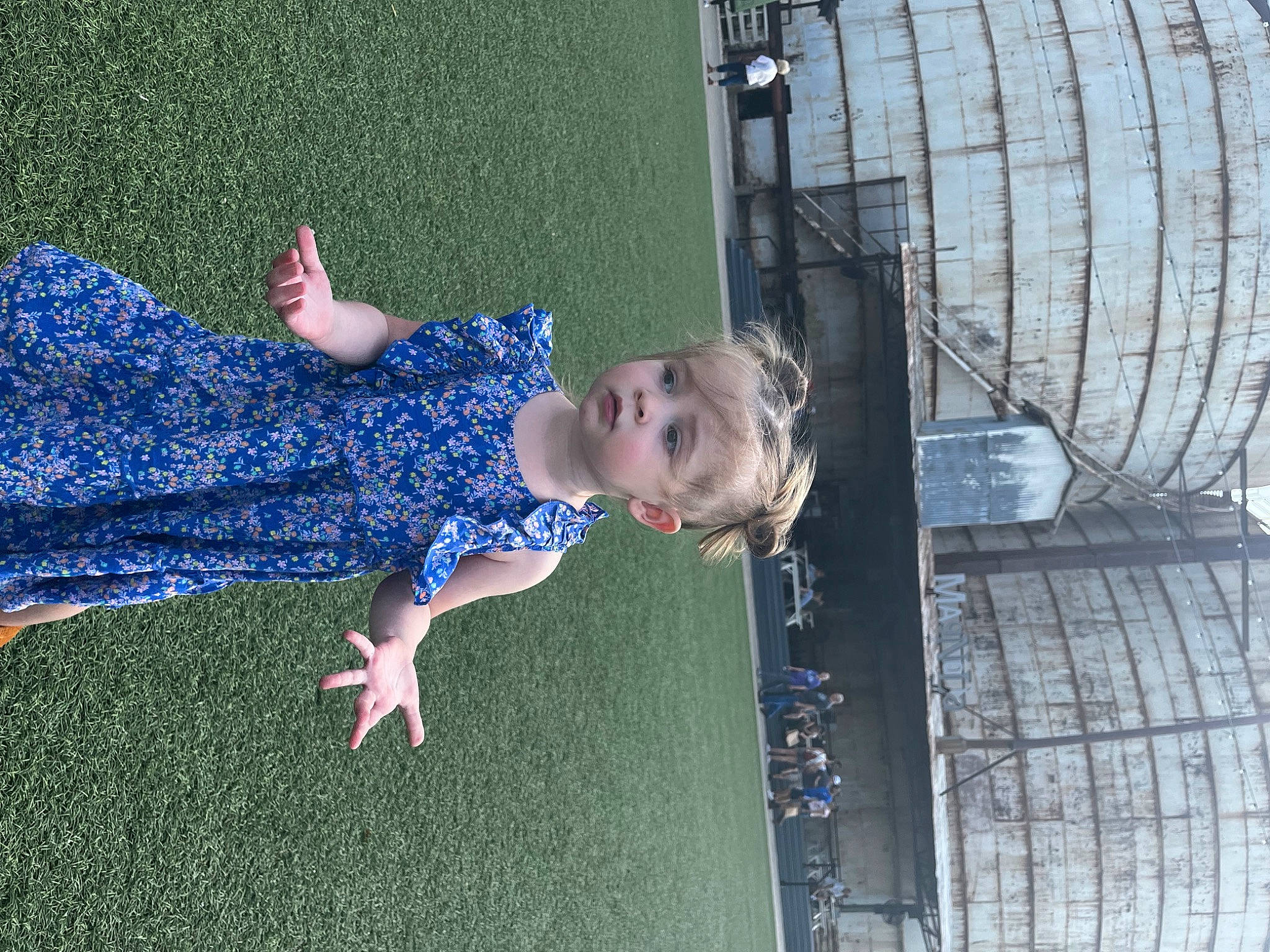 Eden joined the competition — help win amazing prizes! automotive_tire, baby, blue, child, dress, electric_blue, flooring, fun, grass, human_leg, leisure, line, mammal, people_in_nature, person, product, toddler, tree, vertebrate, water