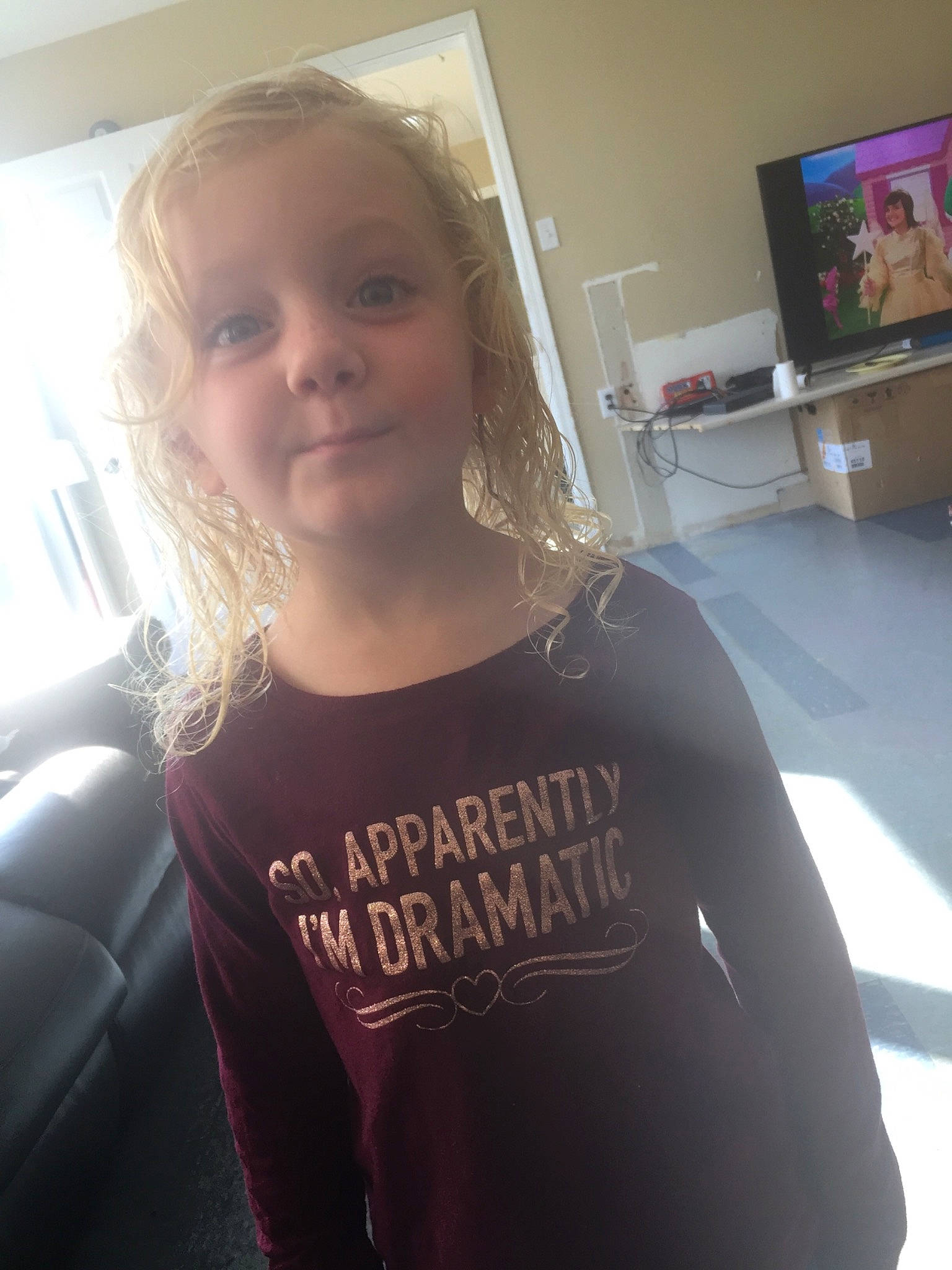 Nayomi joined the competition — help win amazing prizes! arm, blond, child, face, hair, hairstyle, long_hair, person, photography, room, selfie, shoulder, skin, smile, sportswear, t_shirt, toddler, tooth, top, vacation