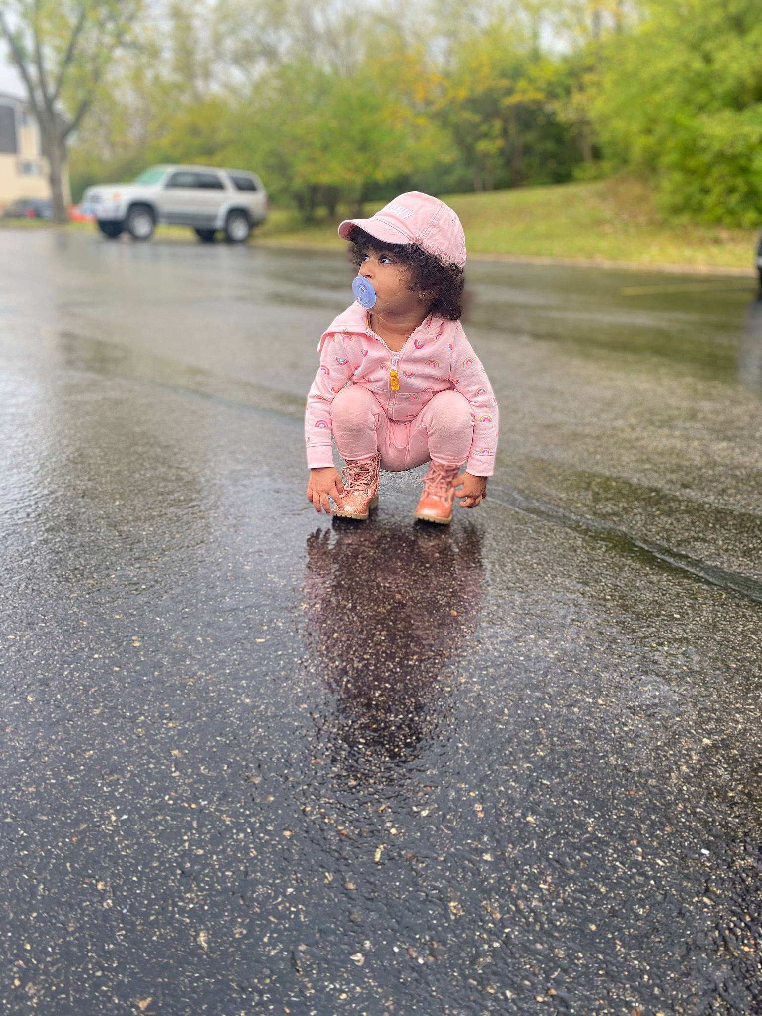 Aaliyah joined the competition — help win amazing prizes! asphalt, car, child, dress, flooring, freezing, fun, grass, jacket, landscape, leisure, person, puddle, recreation, road, road_surface, sidewalk, tar, toddler, tree