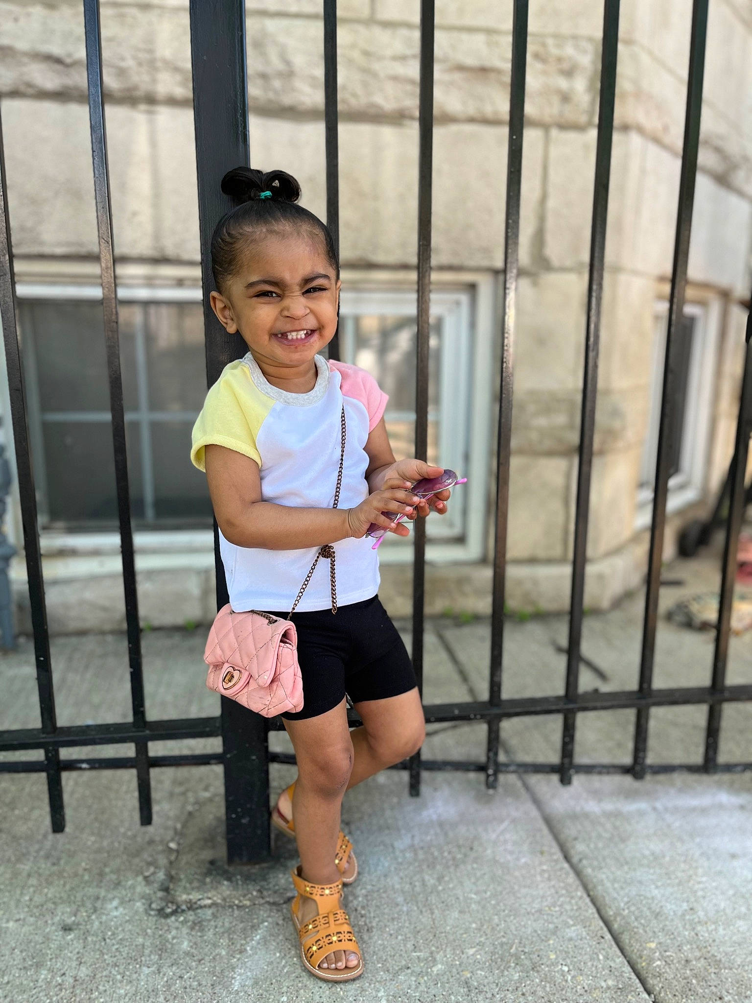 Aaliyah is registered to the contest to win money with this photo: baby_toddler_clothing, child, footwear, goggles, happy, hat, joint, joy, knee, leisure, people, person, shorts, shoulder, sleeve, smile, sneakers, standing, sunglasses, thigh
