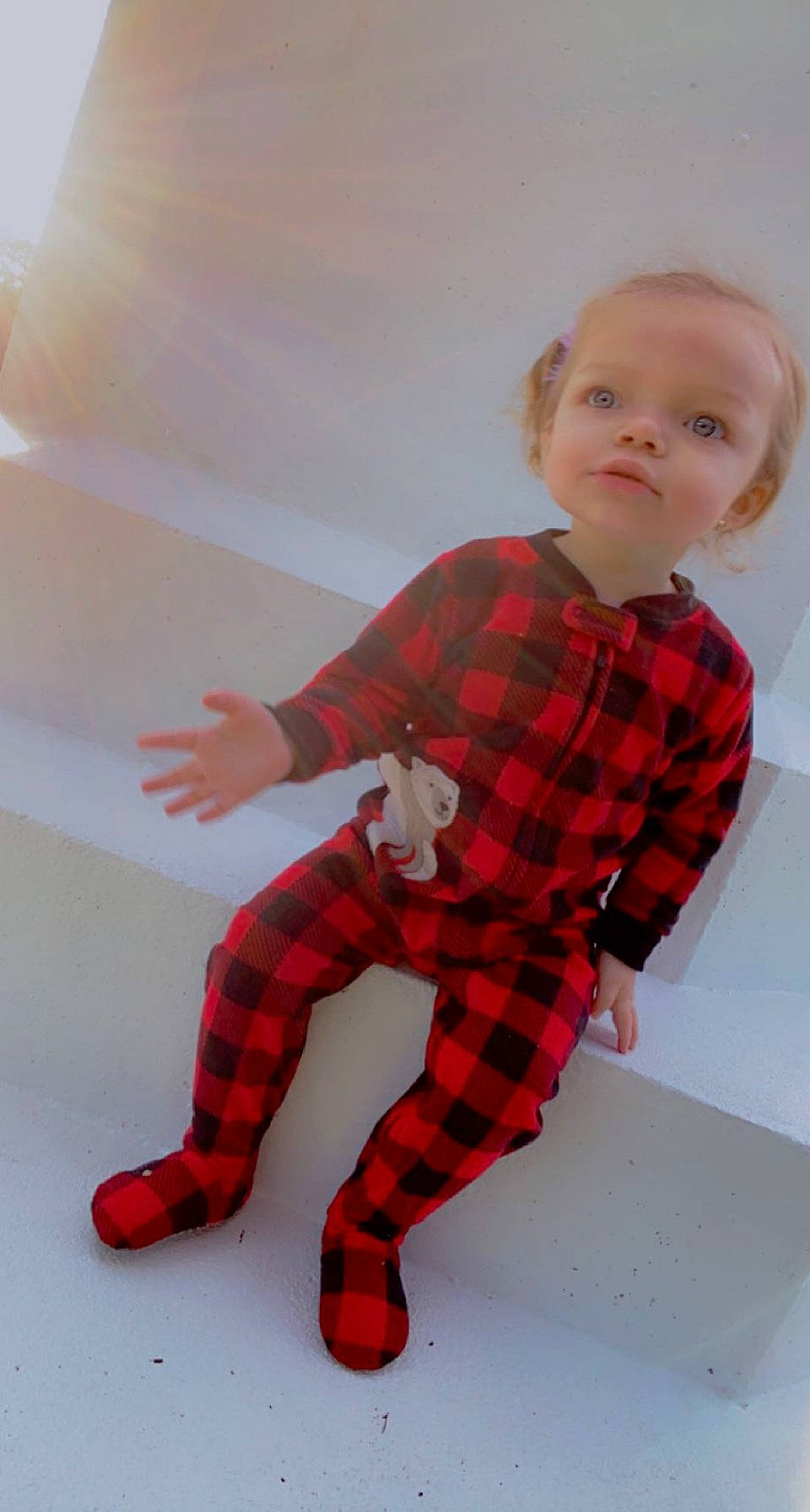 Angel is registered to the contest to win money with this photo: arm, baby_toddler_clothing, collar, comfort, fun, hairstyle, human_body, human_leg, knee, leg, pattern, person, plaid, sitting, sleeve, sock, standing, tartan, thigh, toddler