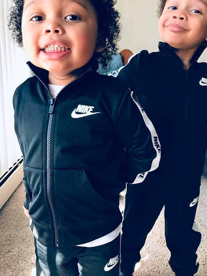 Shay is registered to the contest to win money with this photo: baby_toddler_clothing, black, child, cool, electric_blue, face, facial_expression, flash_photography, fun, gesture, hairstyle, happy, joy, outerwear, person, shoulder, sleeve, smile, t_shirt, textile