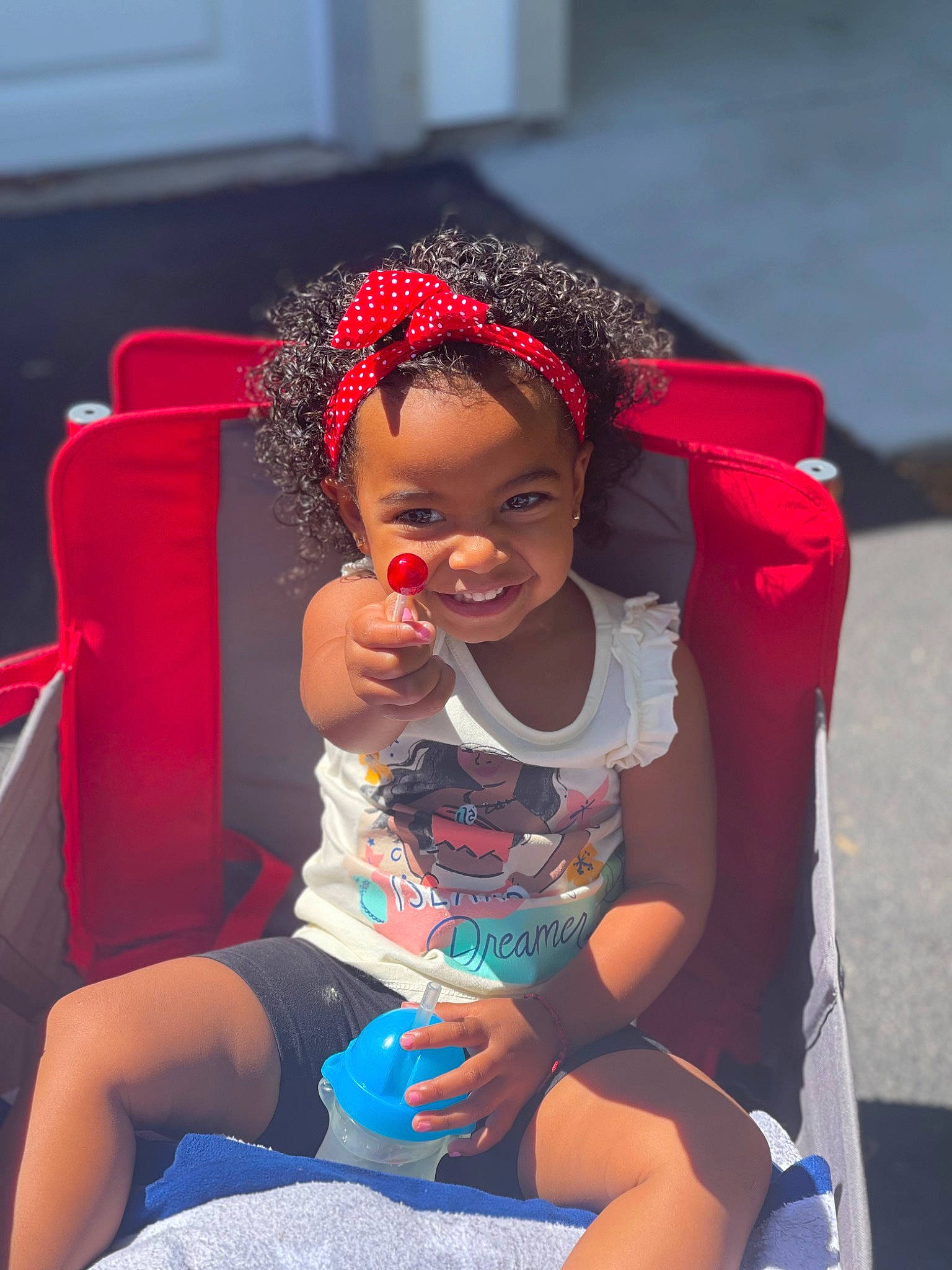 Jordyn joined the competition — help win amazing prizes! blue, carmine, chair, child, electric_blue, entertainment, event, fashion_accessory, fun, happy, headgear, human_leg, jewellery, joy, leisure, magenta, person, recreation, sitting, thigh