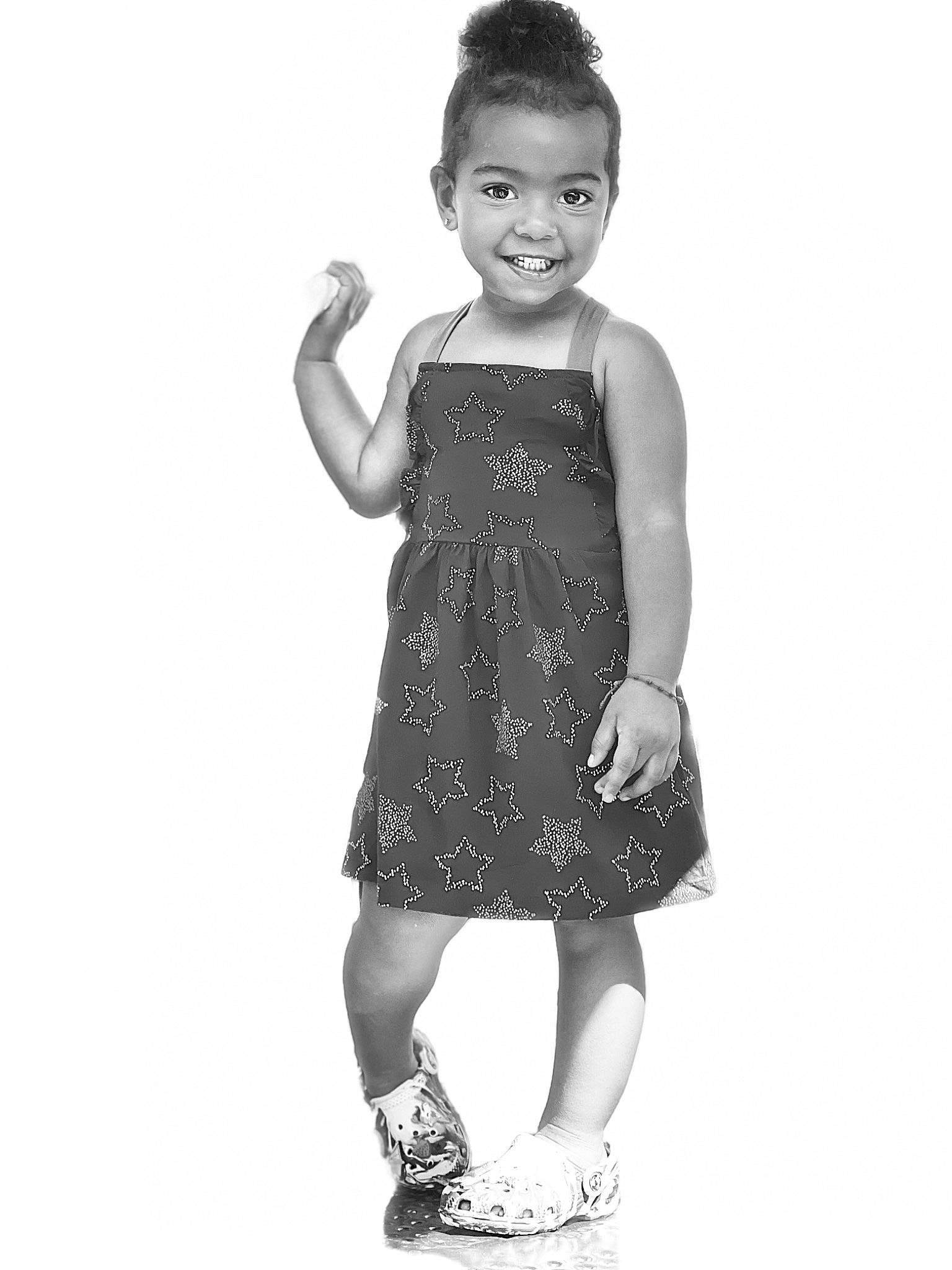 Jordyn is registered to the contest to win money with this photo: arm, black, day_dress, dress, eye, face, flash_photography, footwear, hair, happy, head, human_body, joy, leg, neck, one_piece_garment, person, shoulder, sleeve, smile