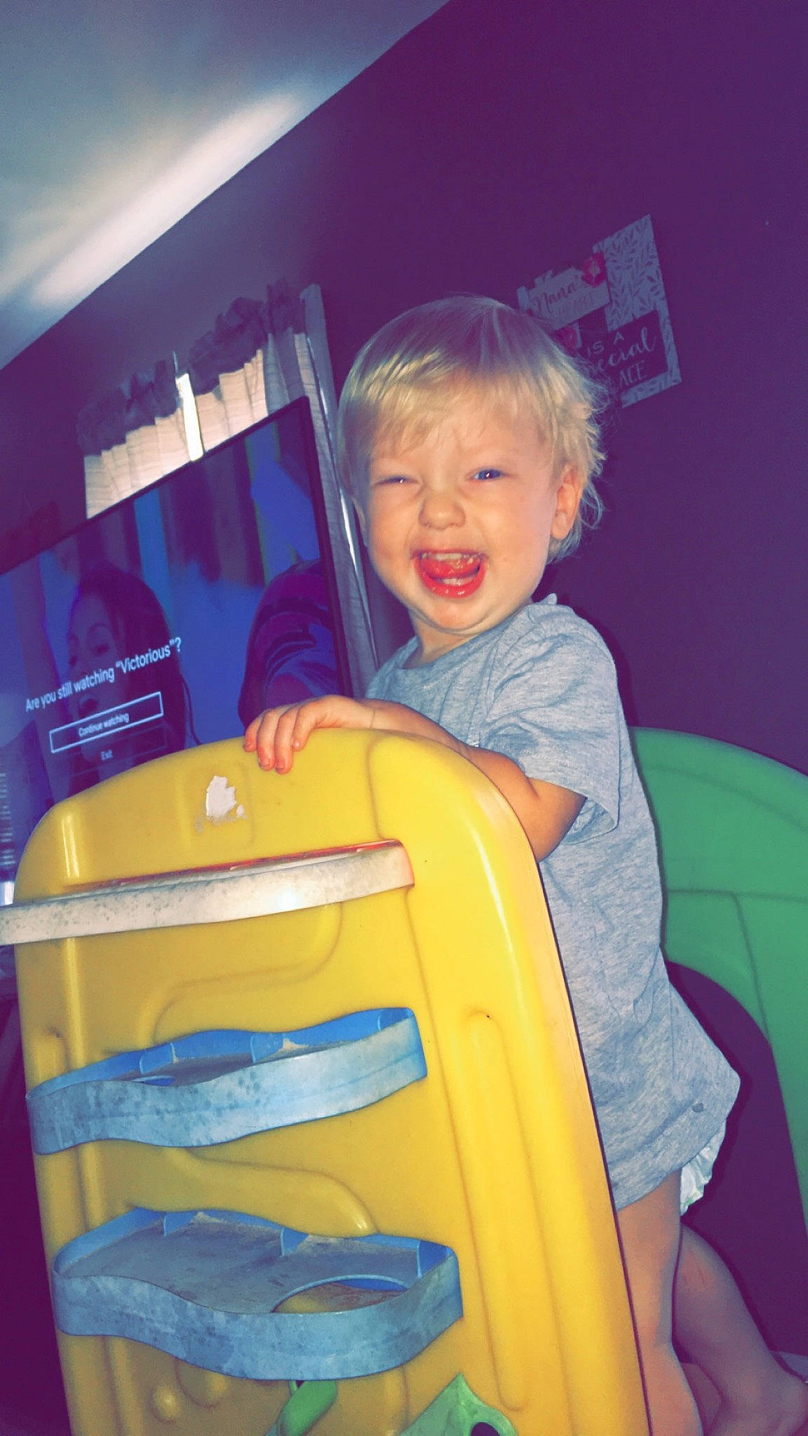 Rhett is registered to the contest to win money with this photo: baby, baby_products, child, fun, furniture, person, play, product, smile, toddler, under_exposed, vacation, yellow