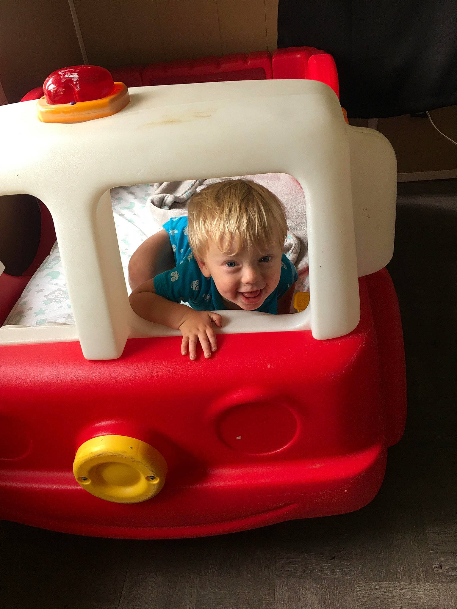Rhett is registered to the contest to win money with this photo: baby, baby_products, baby_toys, car, child, fun, games, joy, person, pink, plastic, play, product, red, toddler, toy, vehicle