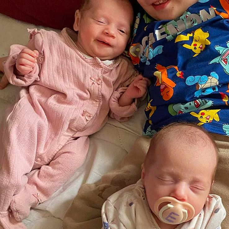 Eva is registered to the contest to win money with this photo: baby, blanket, book, clothing, crib, cushion, face, furniture, happy, head, homedecor, laughing, newborn, pajamas, person, photography, portrait, publication, quilt, sleeping