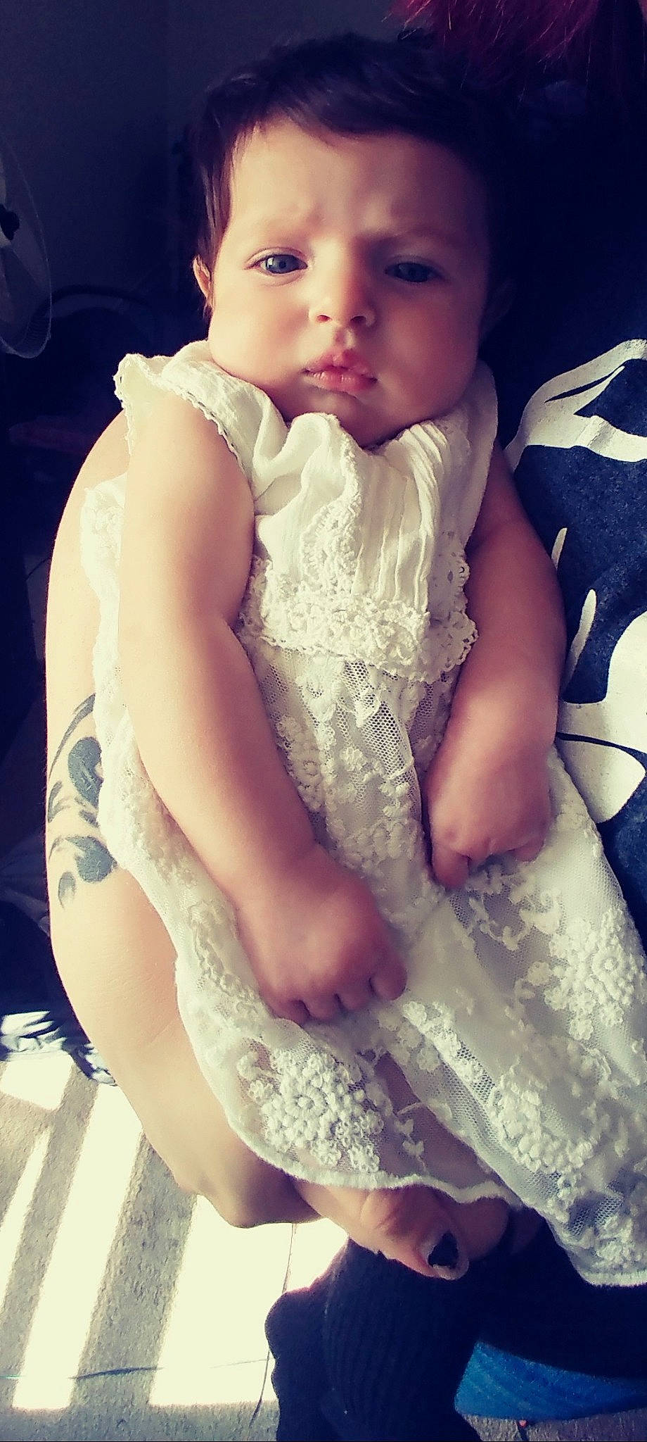 Emilie is registered to the contest to win money with this photo: arm, baby, beauty, cheek, child, cool, eye, face, hand, human_leg, leg, lip, long_hair, nose, person, sitting, skin, thigh, toddler